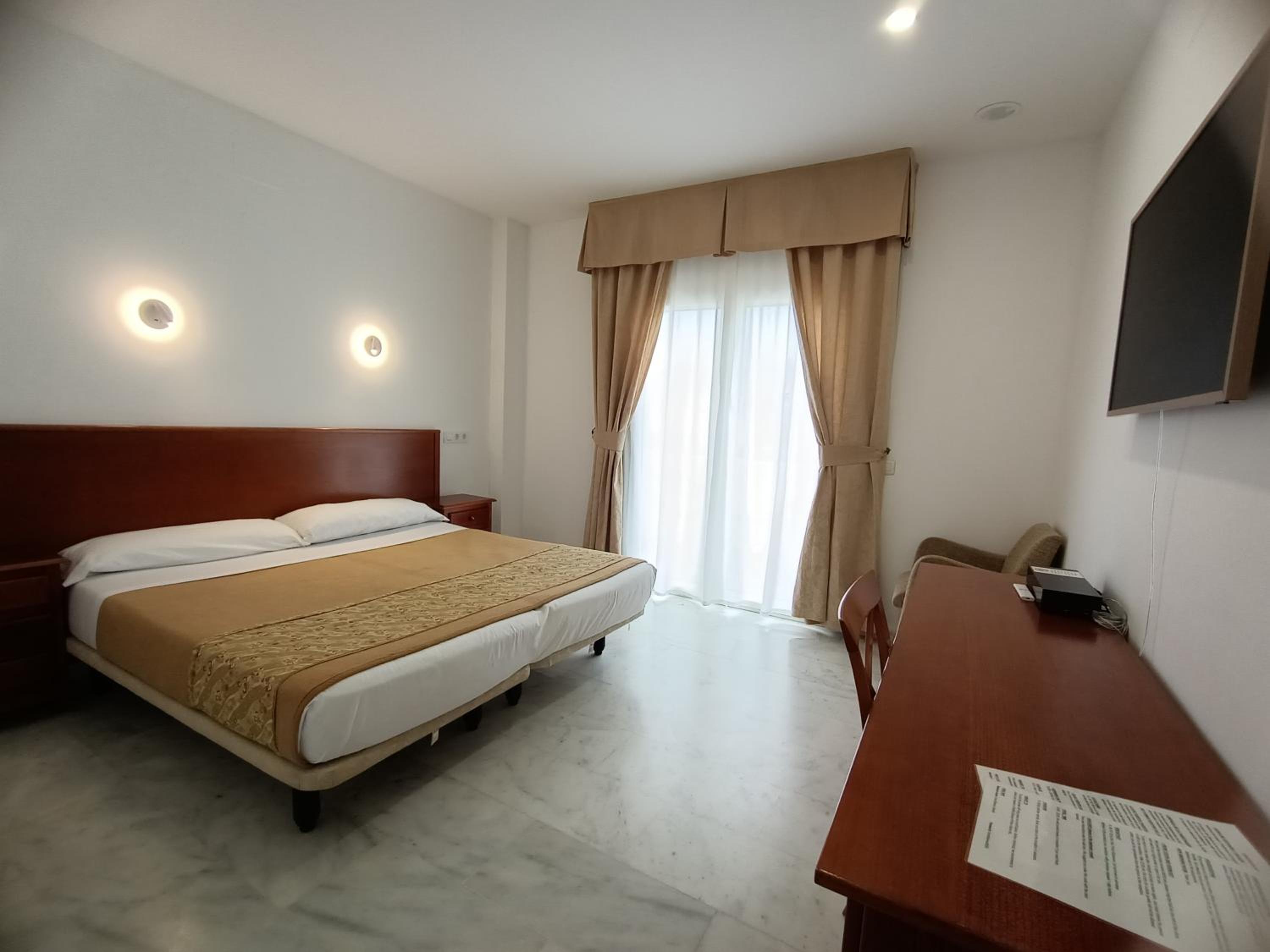 Habitación Doble Estándar o con Dos Camas Individuales.