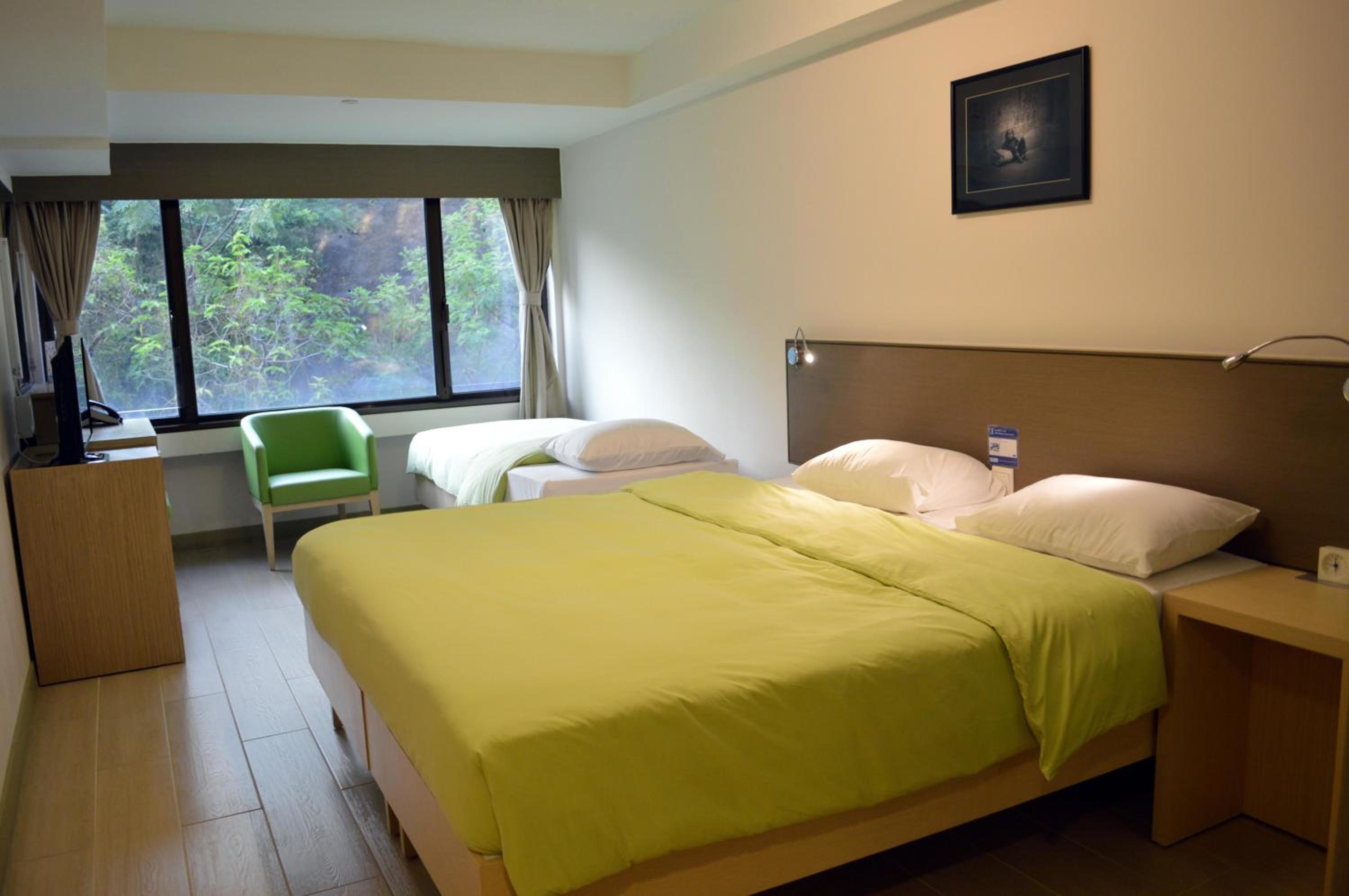 Triple Room with 1 Double and 1 Single Bed