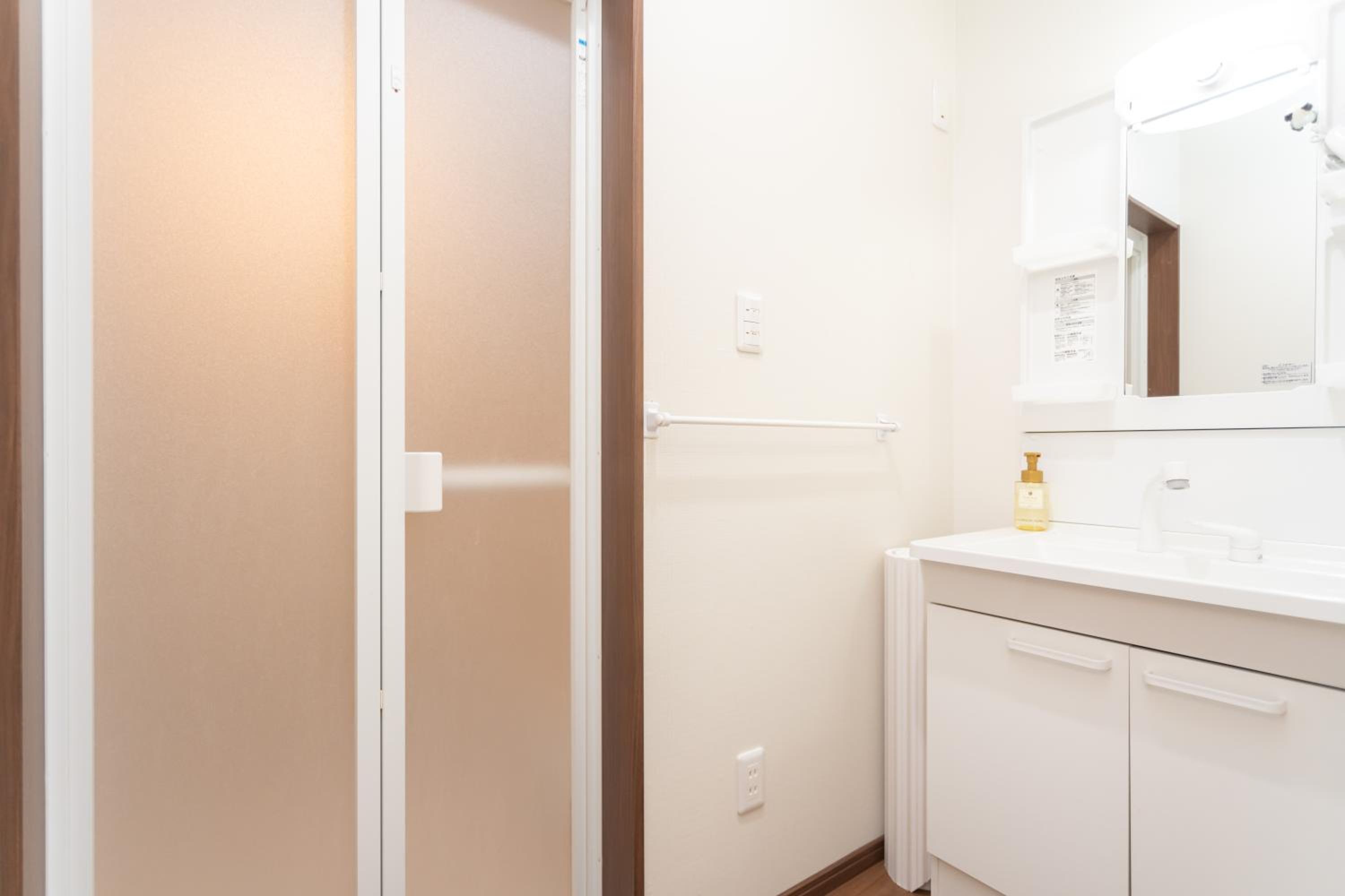 Three-Bedroom House - Photo 249