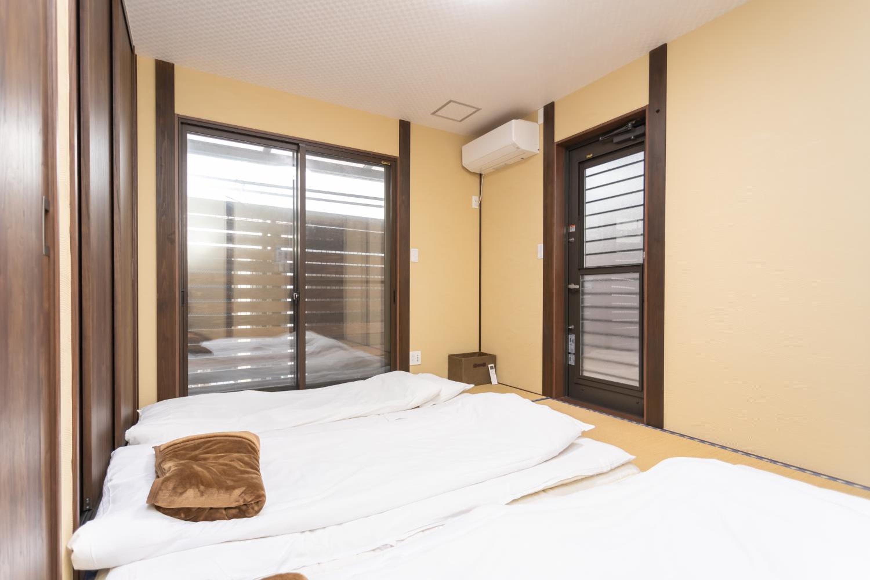 Three-Bedroom House - Photo 168