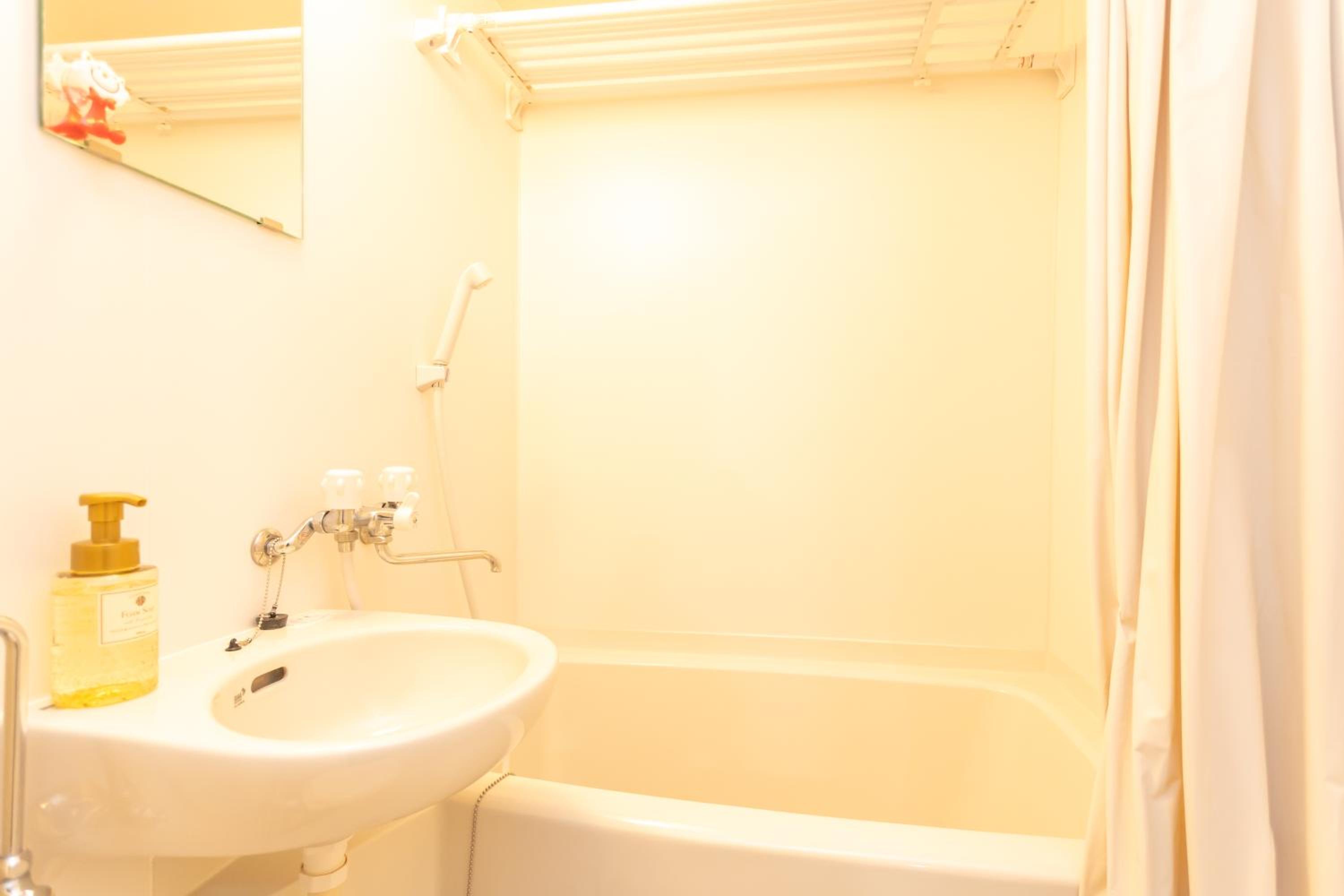 Three-Bedroom House - Photo 175