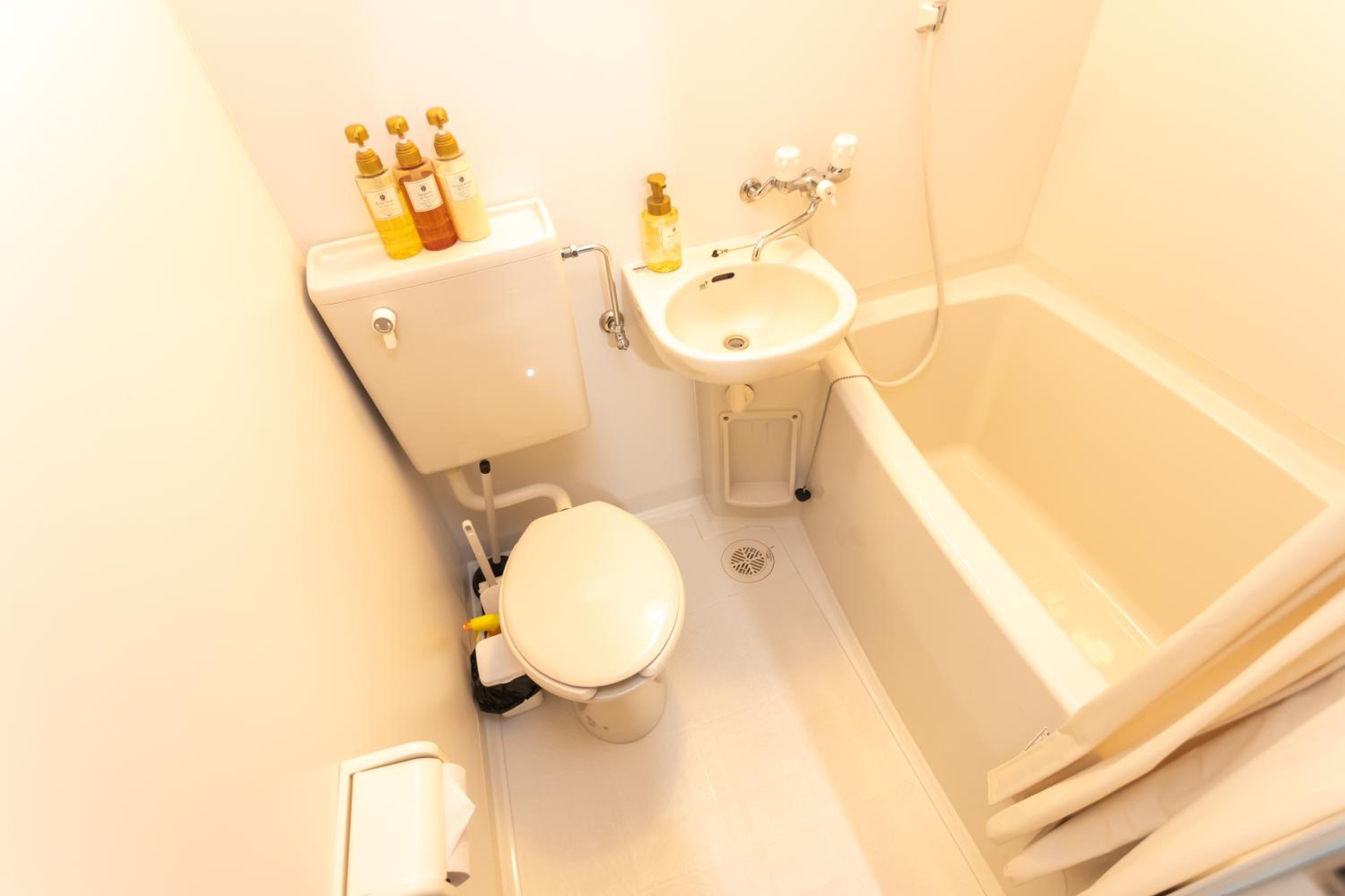 Three-Bedroom House - Photo 161