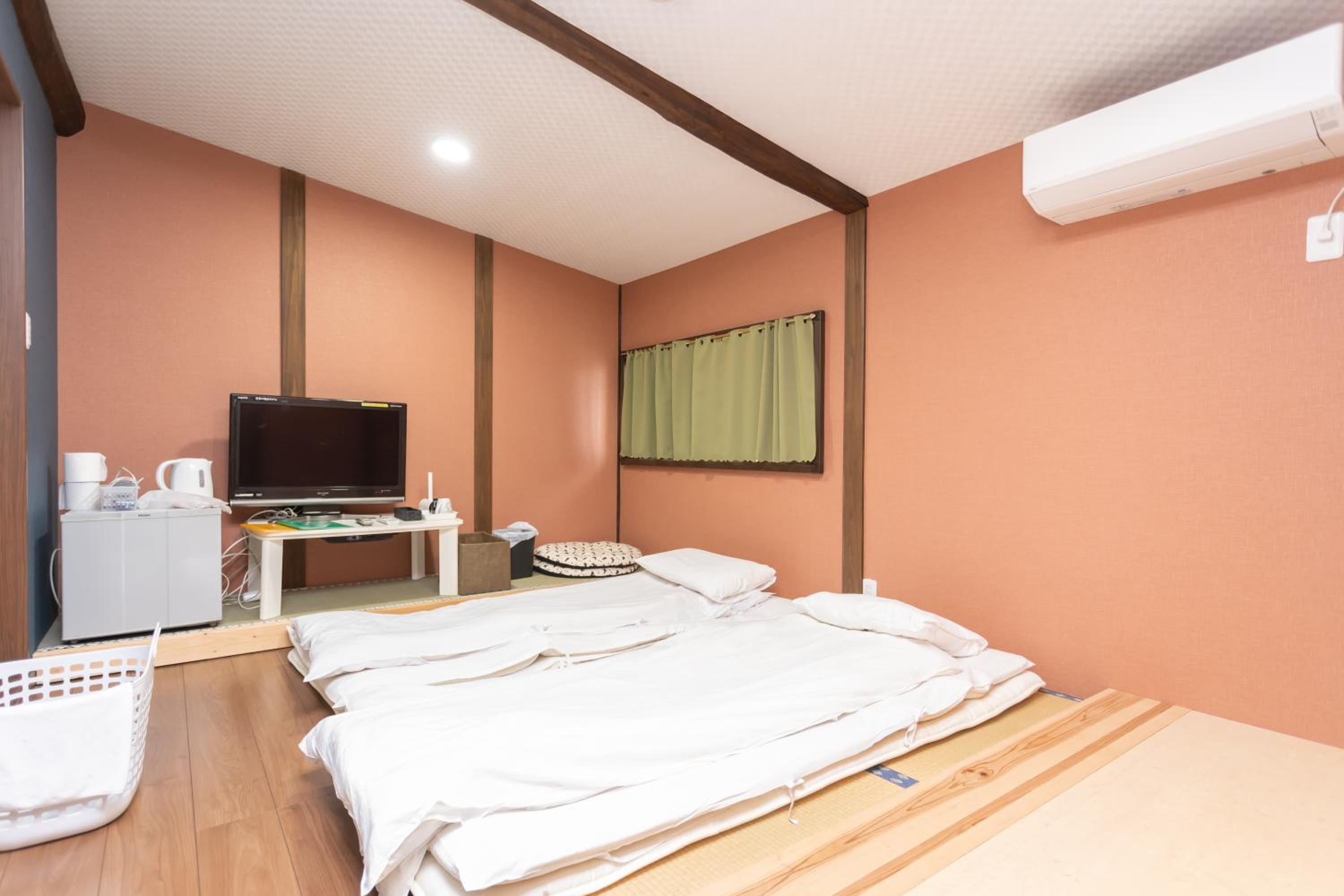 Three-Bedroom House - Photo 33