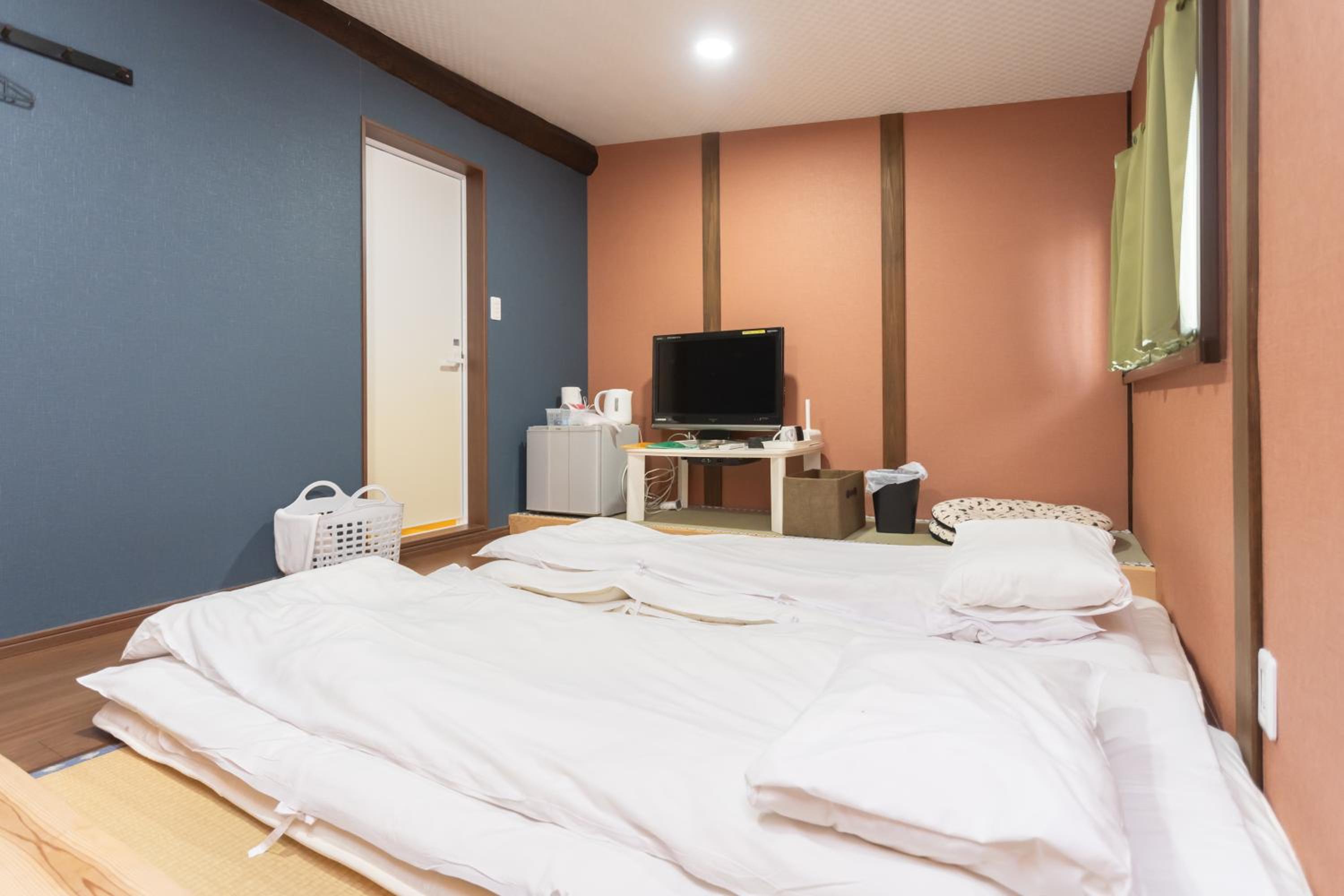 Three-Bedroom House - Photo 20