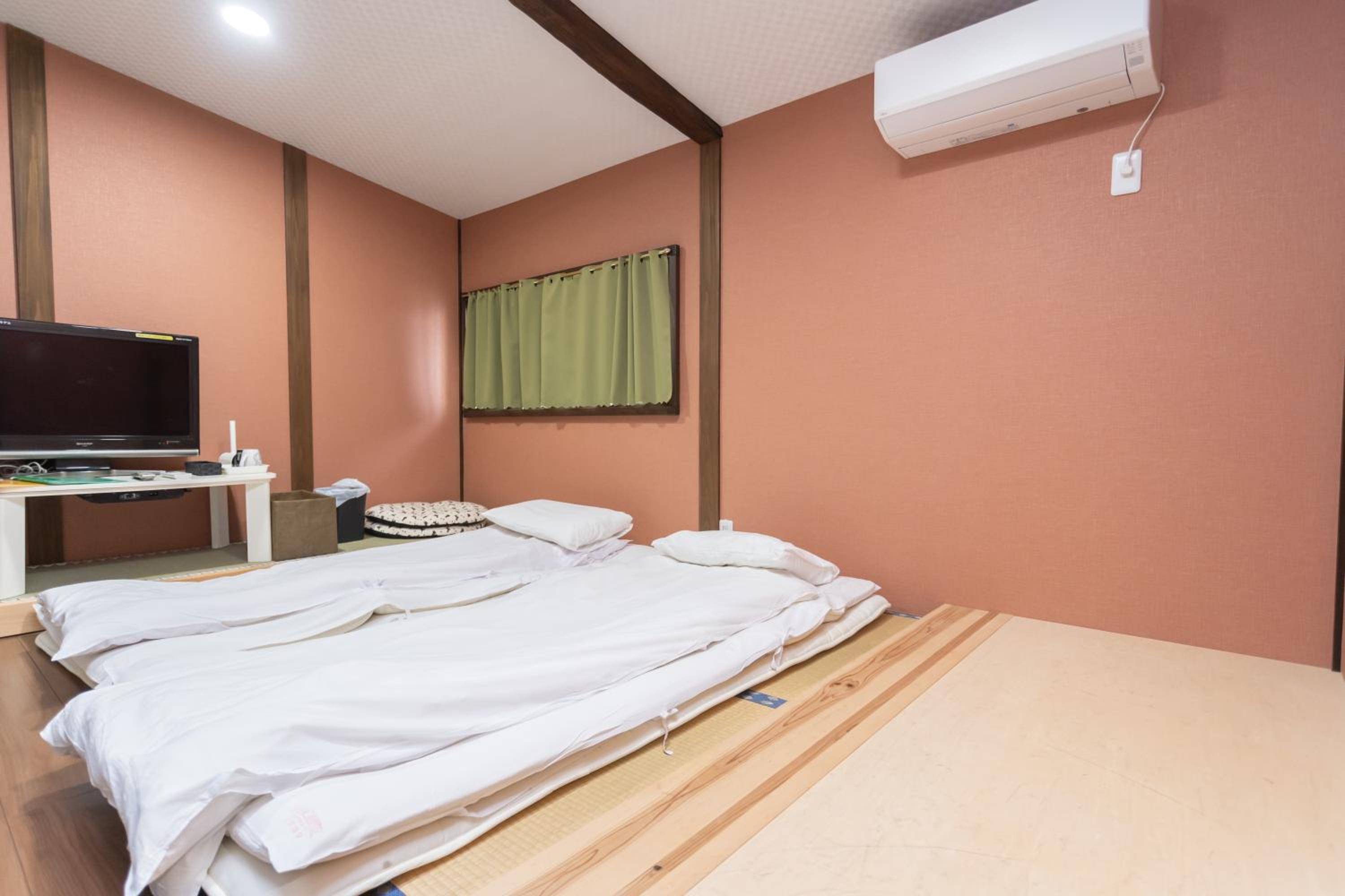 Three-Bedroom House - Photo 22