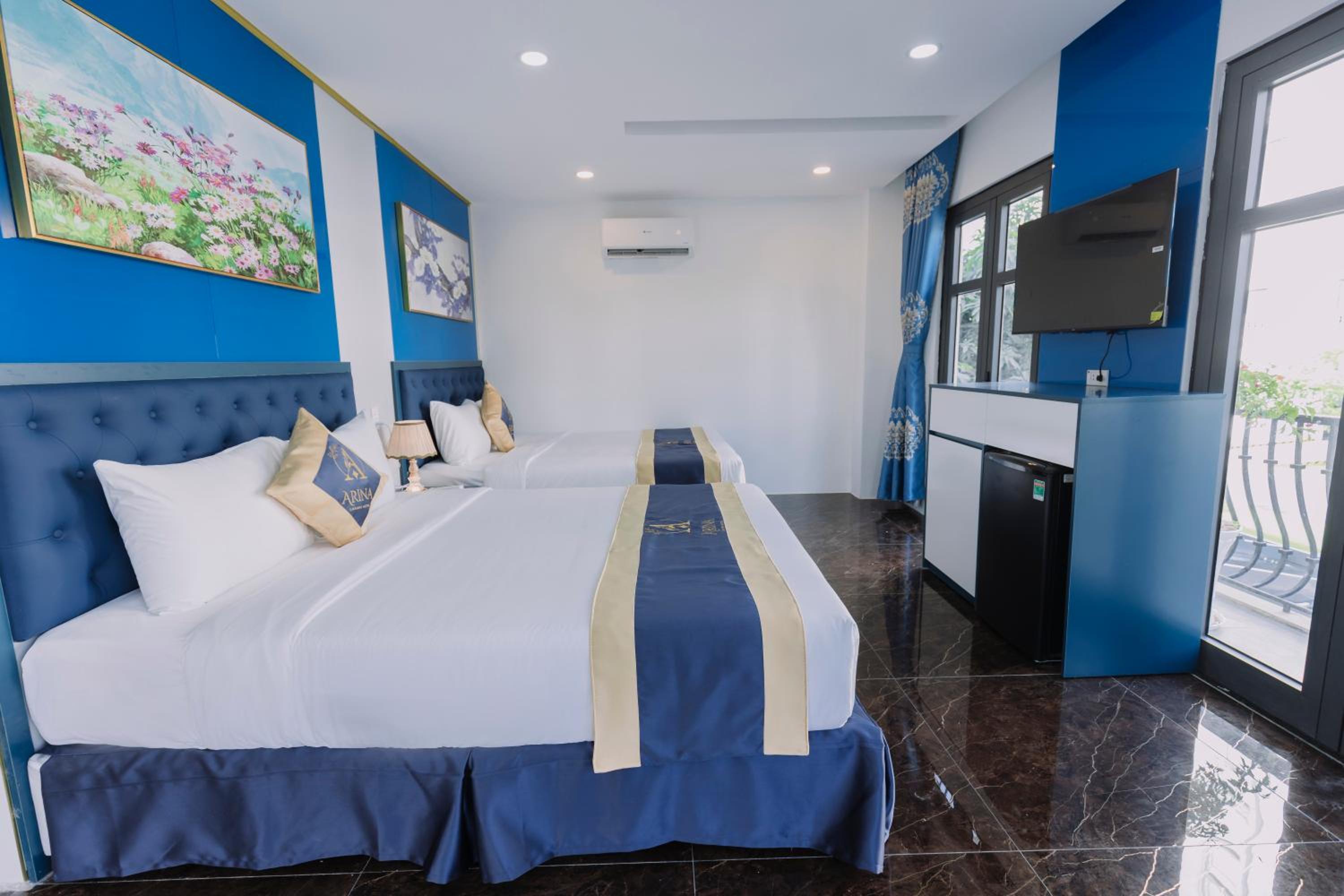 Quadruple Room with Balcony - Photo 26
