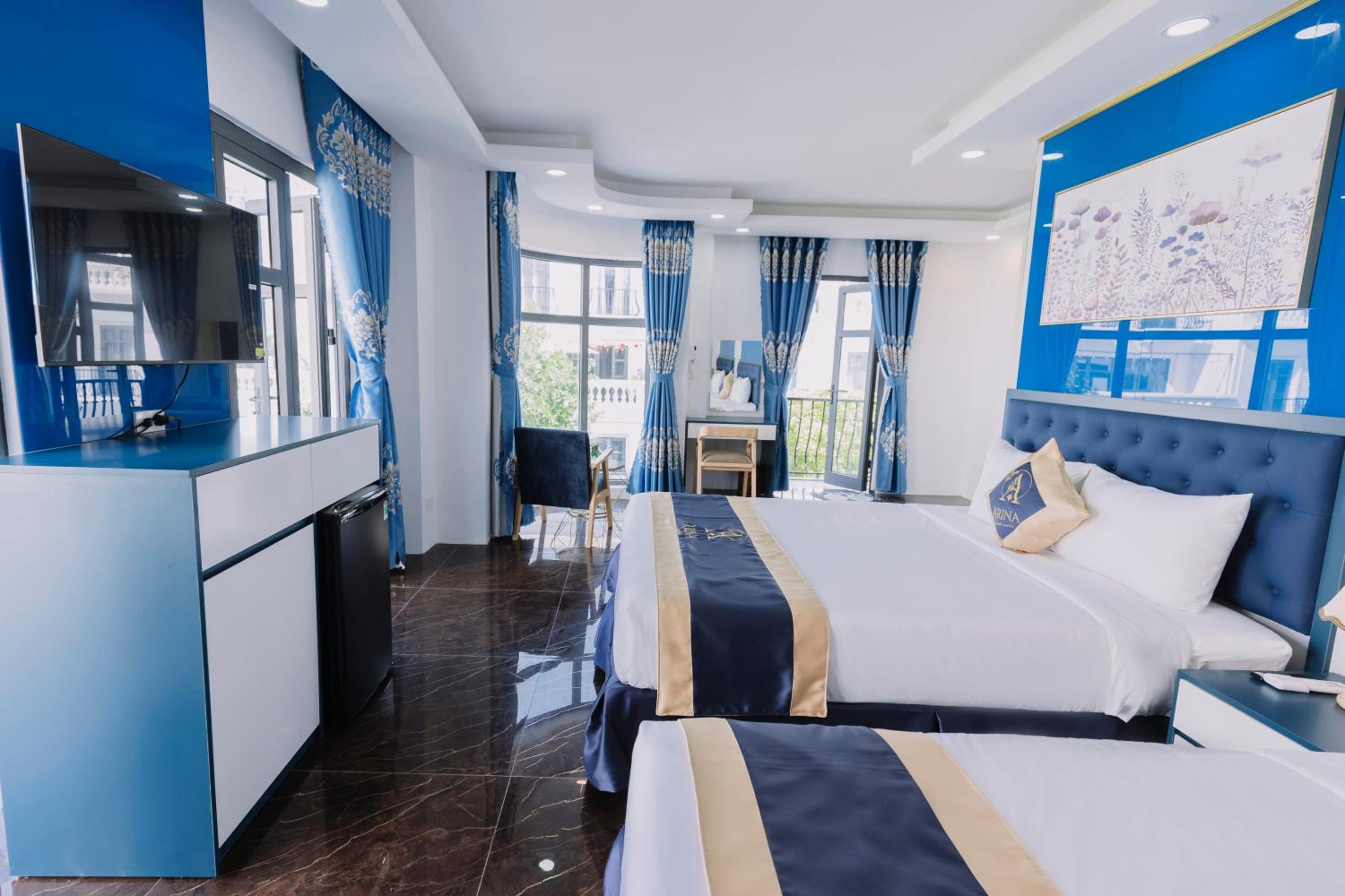 Quadruple Room with Balcony - Photo 5