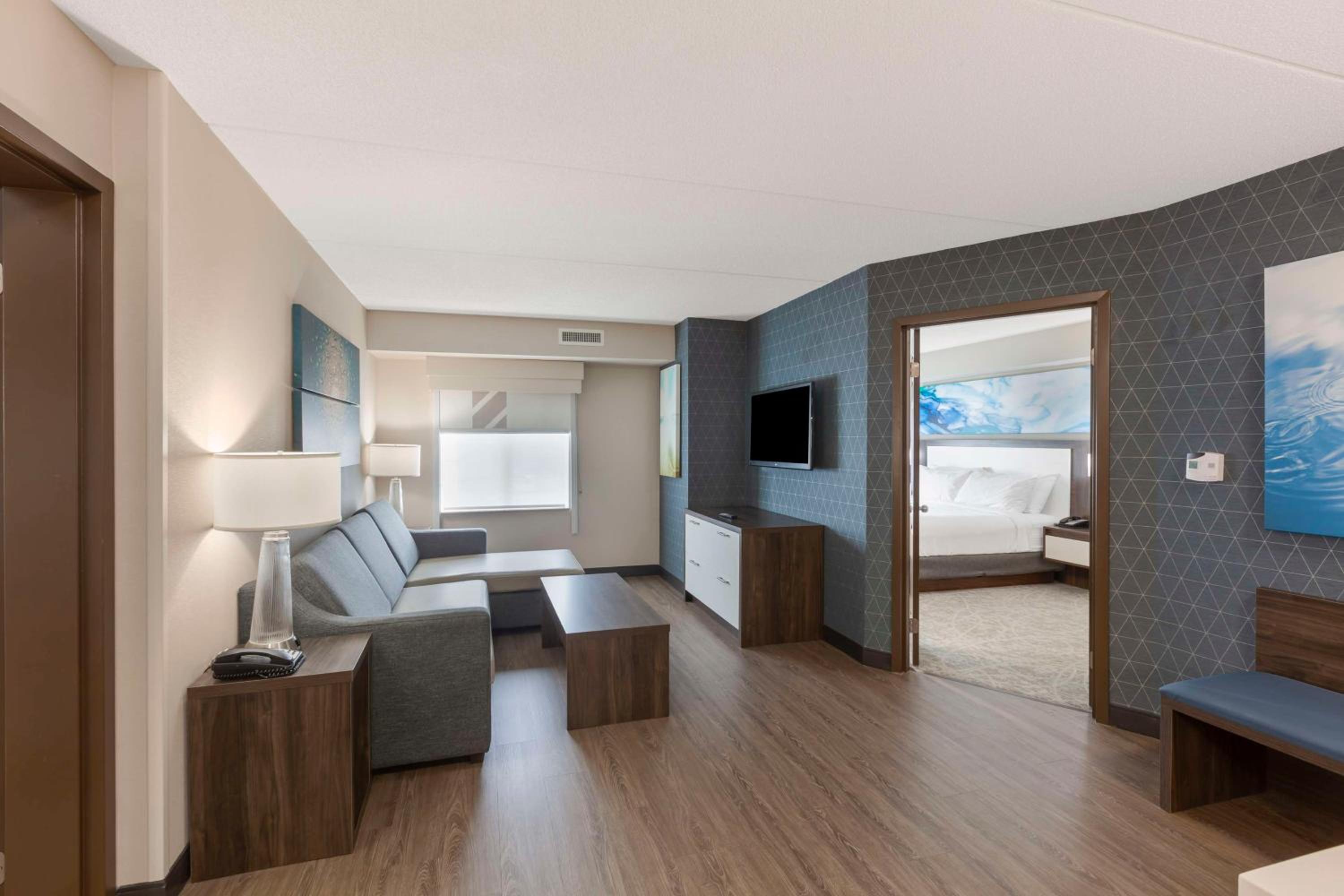 Suite with Two Queen Beds and One King Bed Room - Disability Access