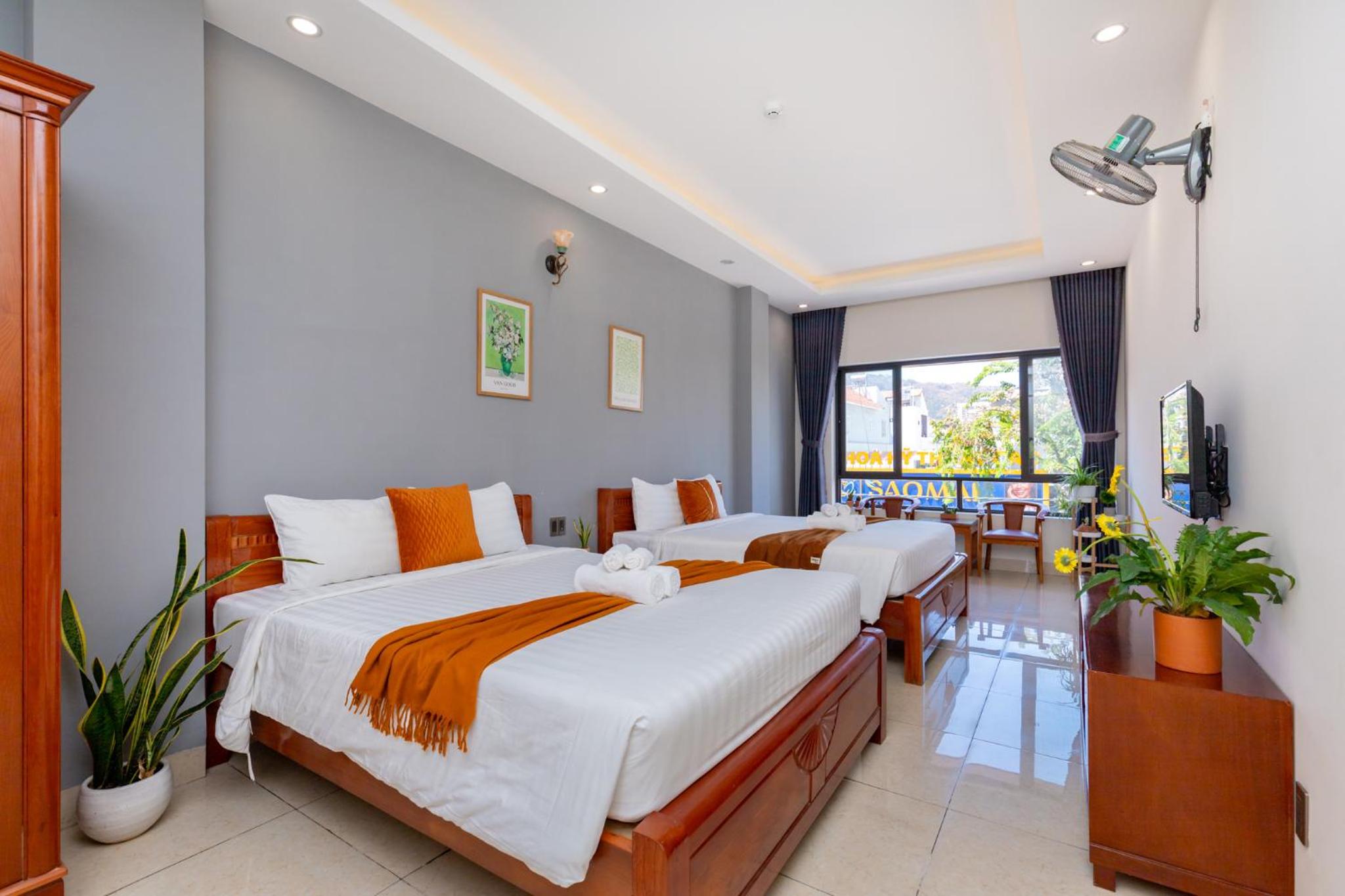Deluxe Queen Room With Two Queen Beds photo 1