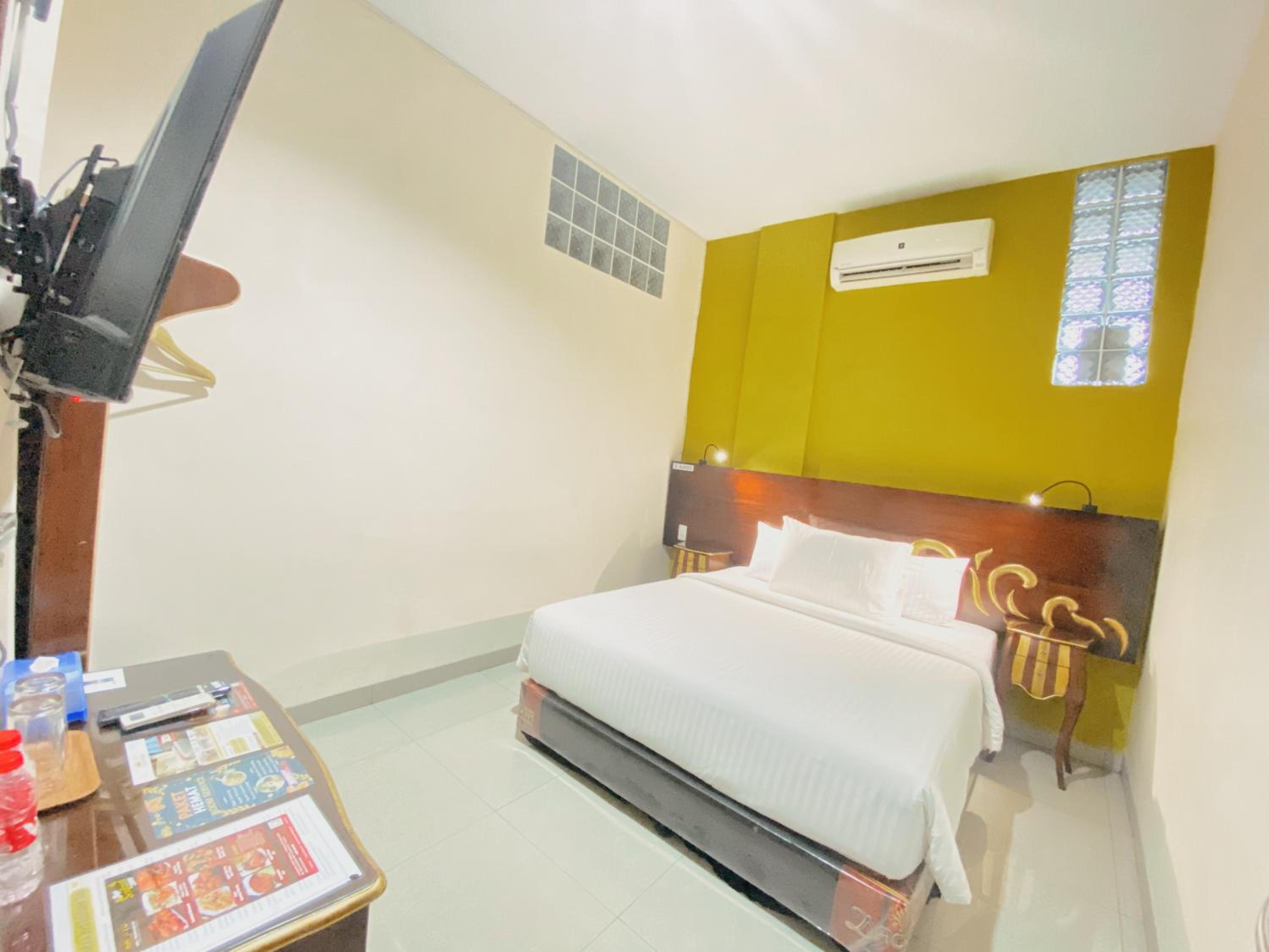 Deluxe Room - Photo 3