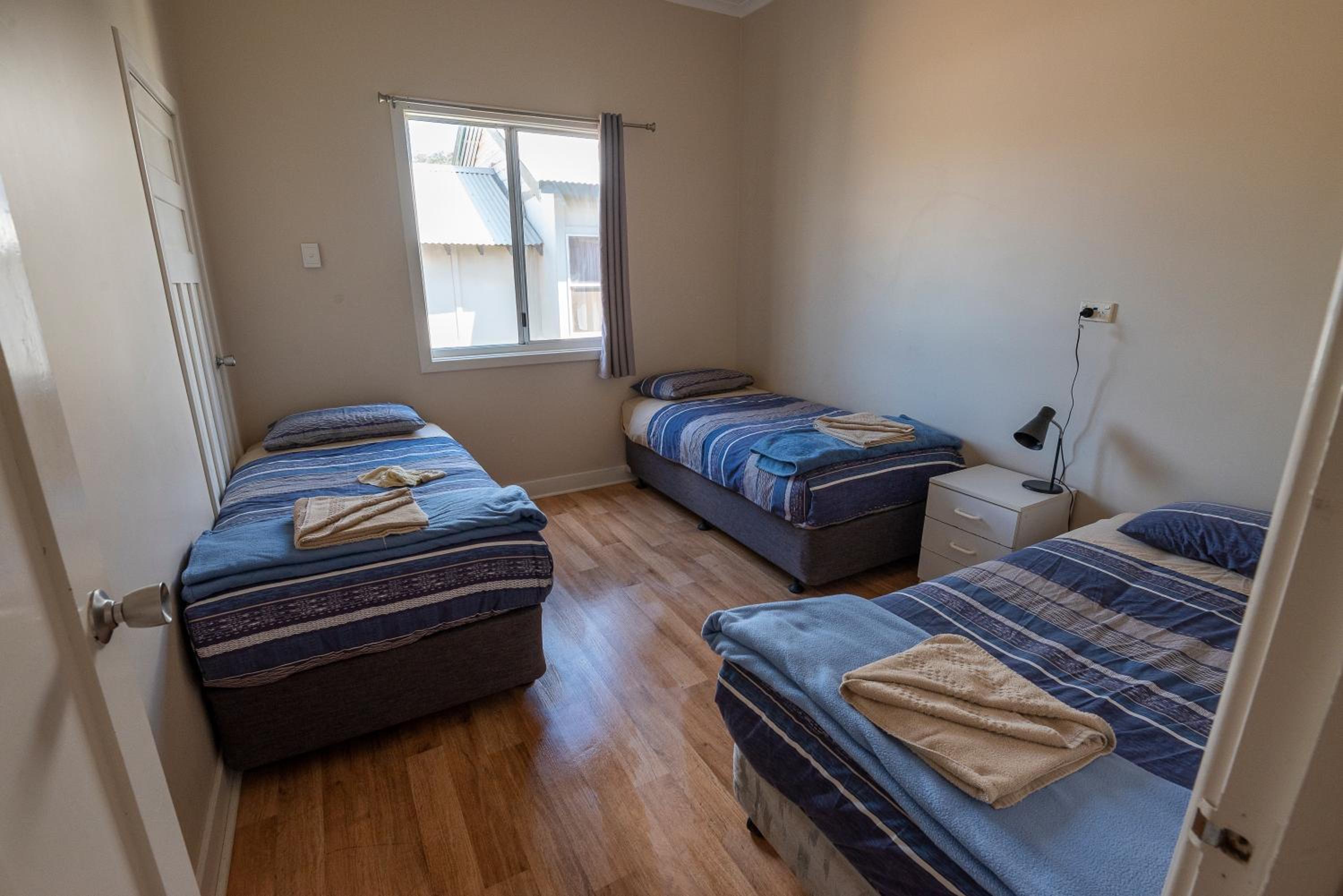 Three-Bedroom Apartment - Photo 11