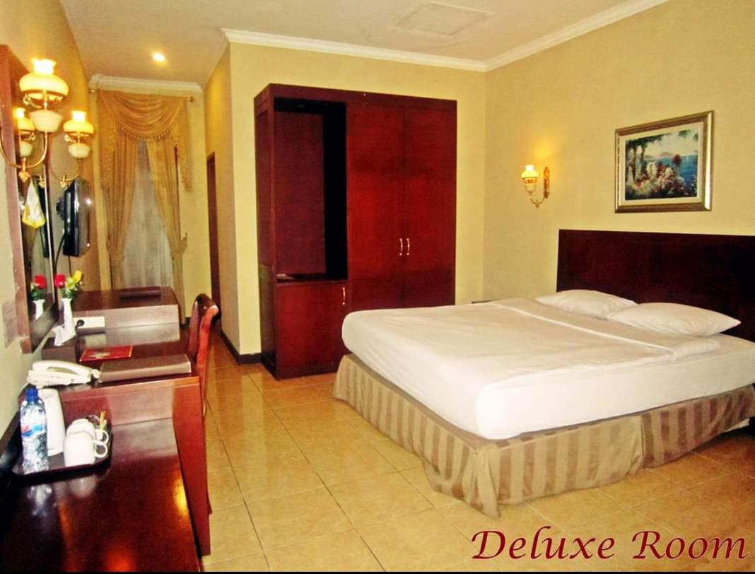 Deluxe Room - Photo 1