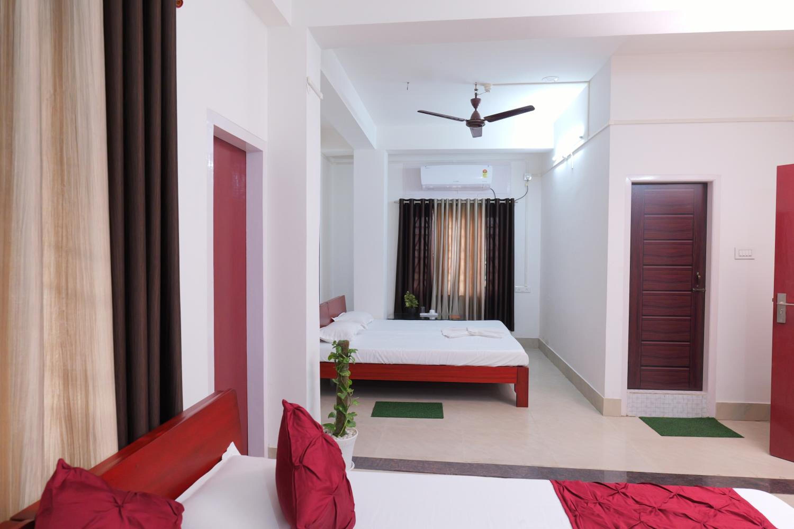 Deluxe Quadruple Room - Photo 7