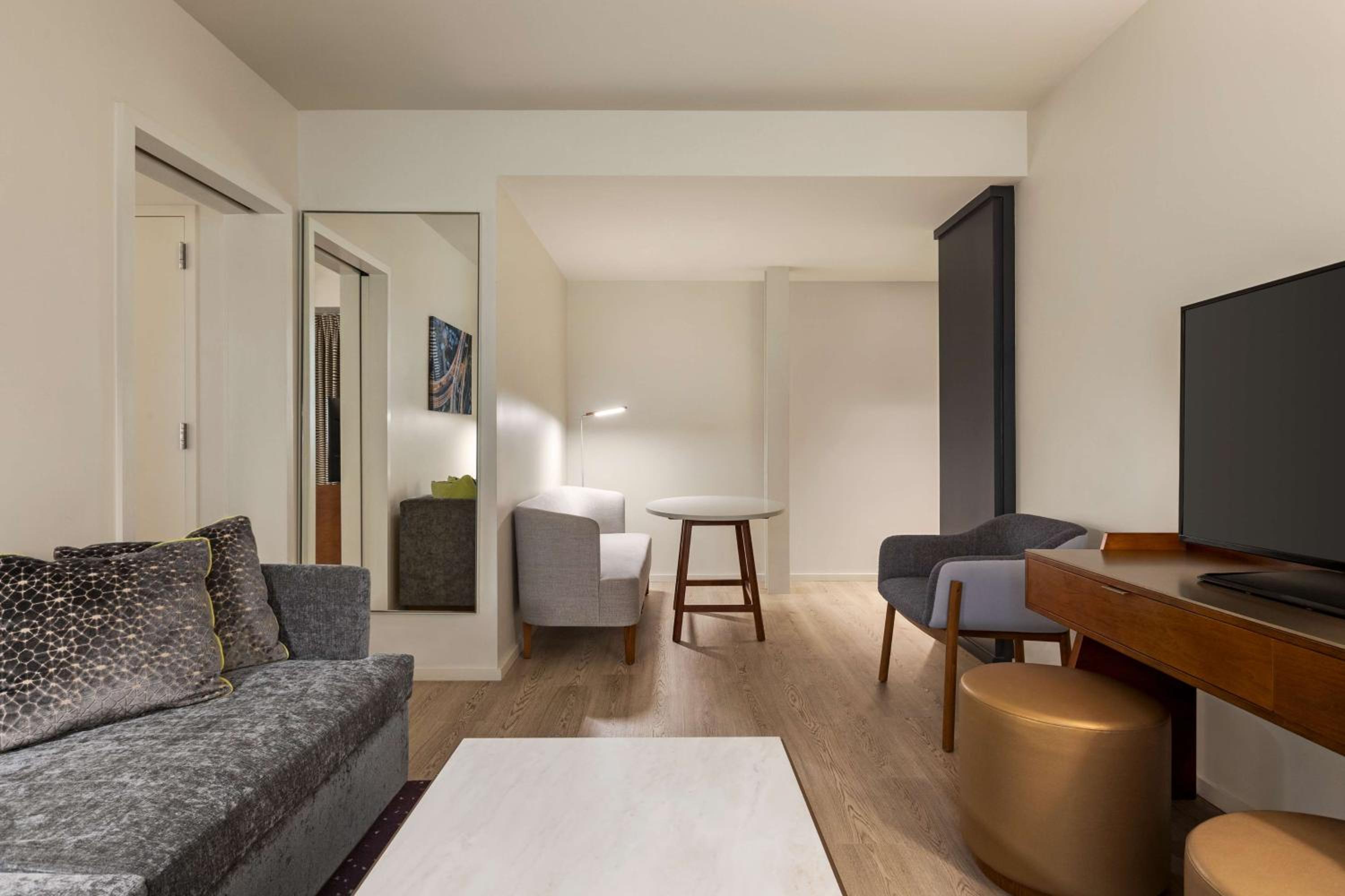 One-Bedroom King Suite with Sofa Bed photo 1