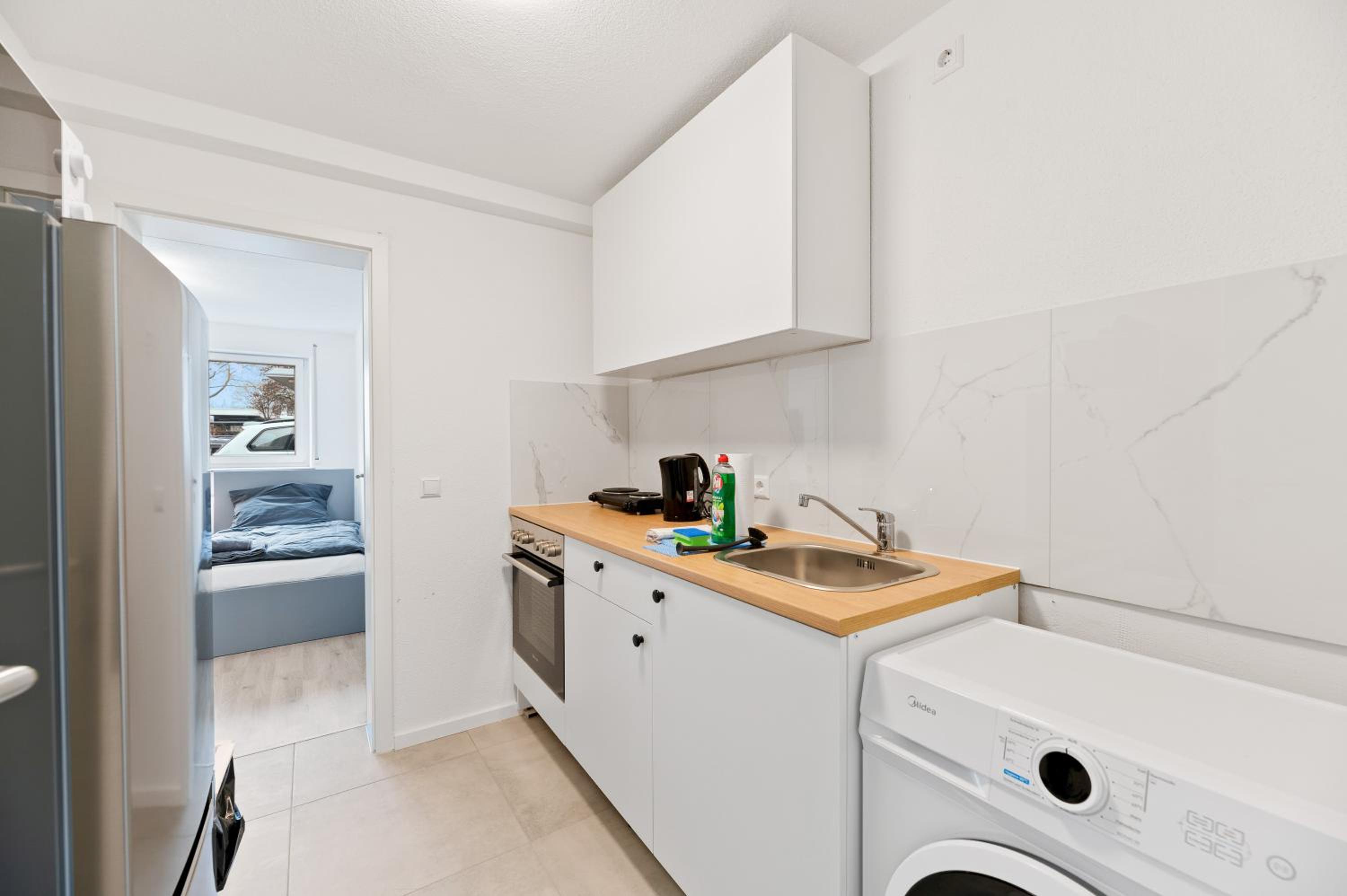 Three-Bedroom Apartment photo 2