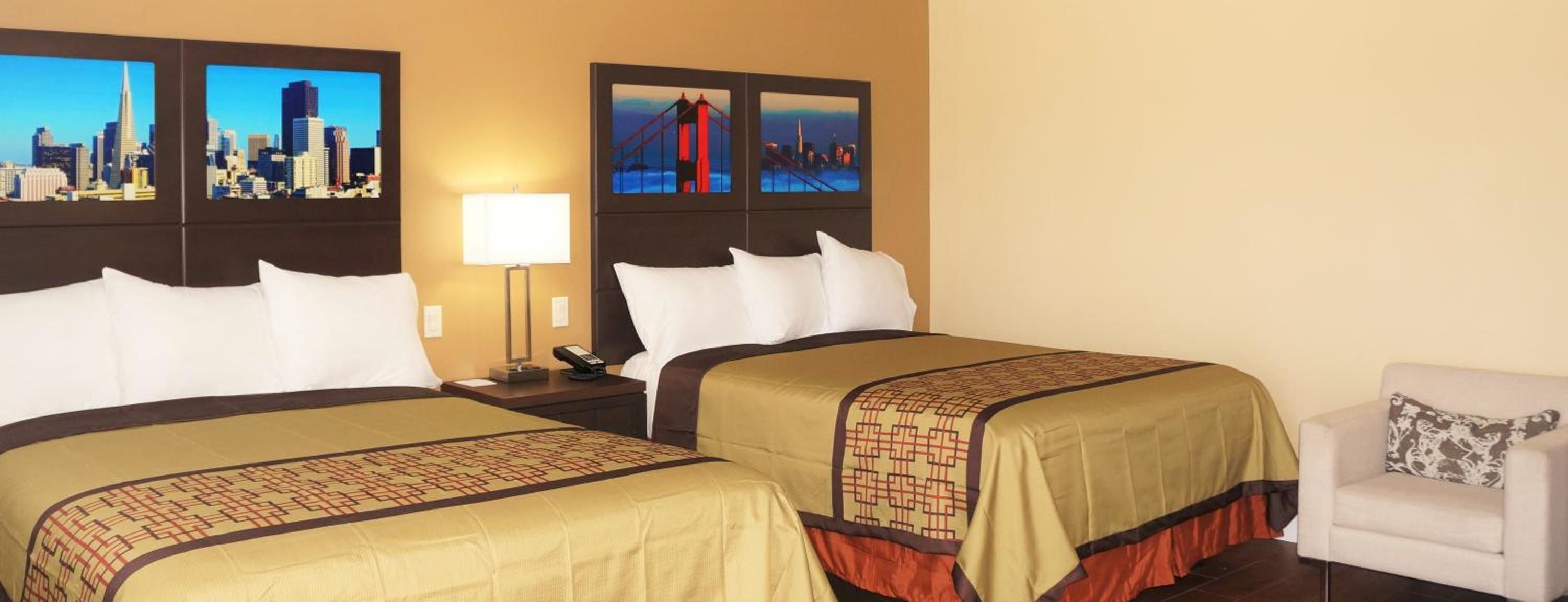 Queen Room with Two Queen Beds - Photo 6