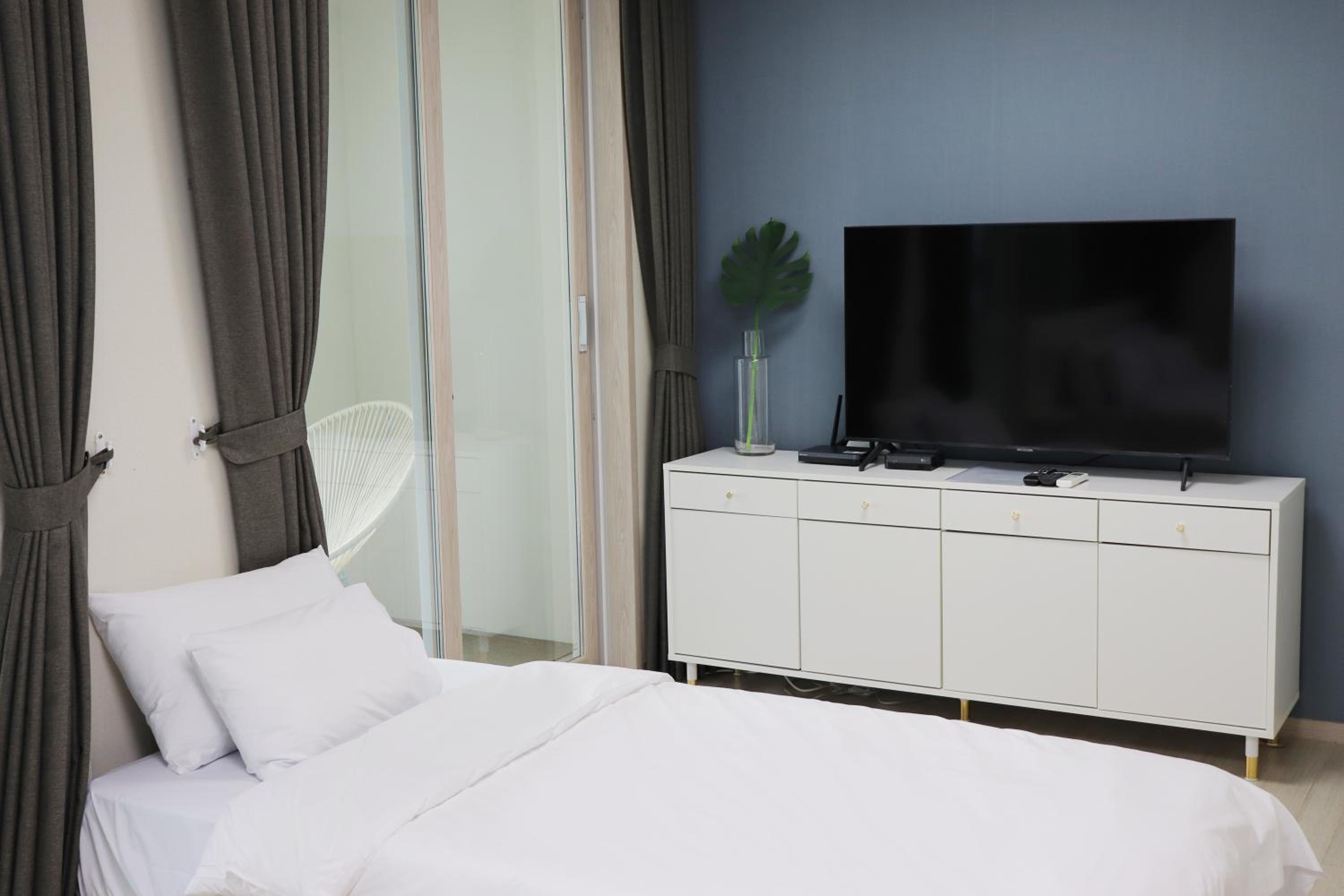 Deluxe Triple Room - Photo 8
