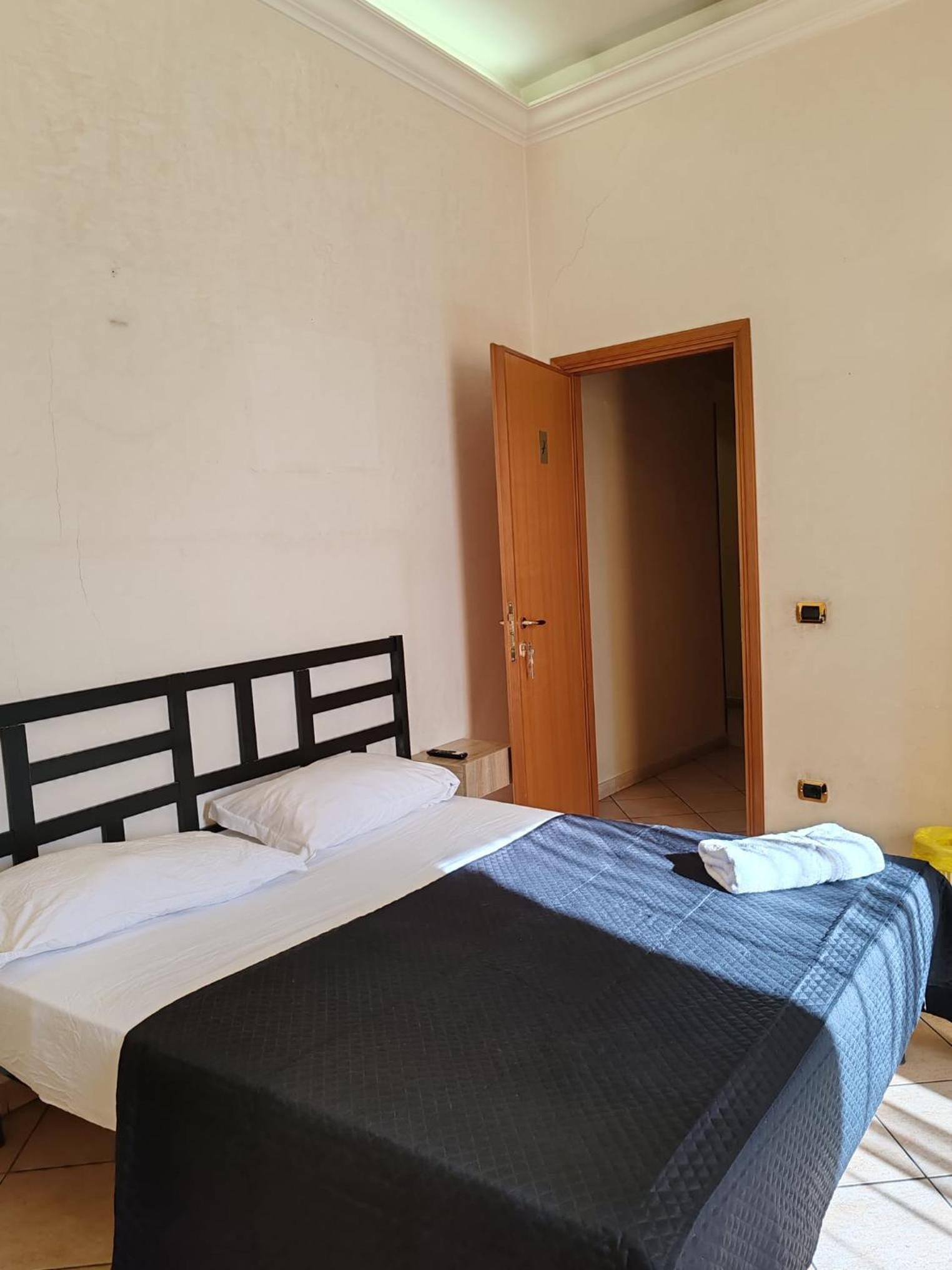 Queen Room with Shared Bathroom