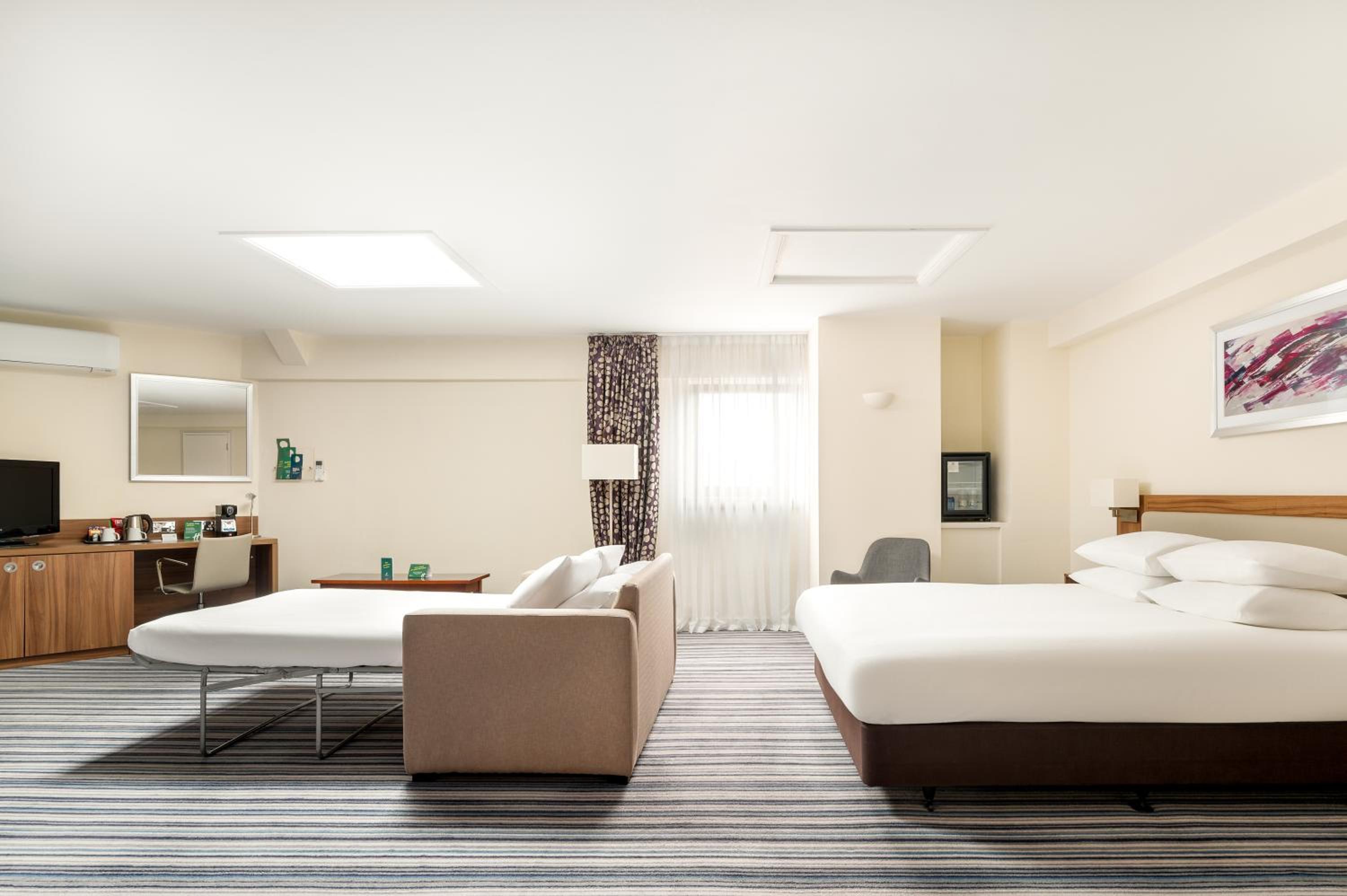 King Suite with Sofa Bed - Photo 14