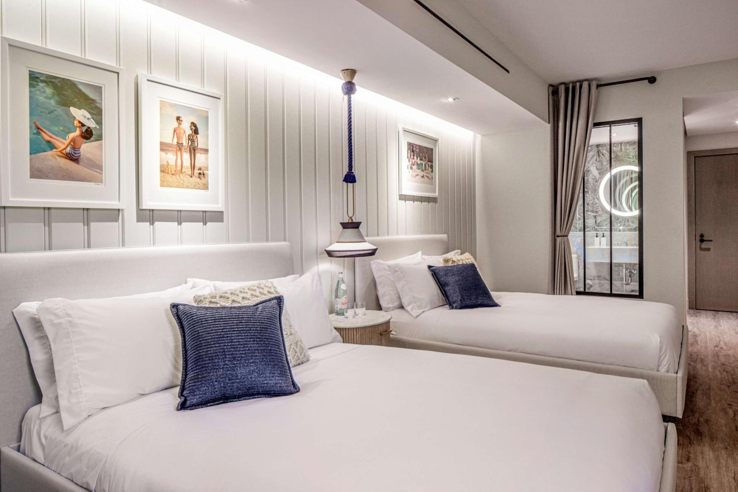 Queen Room with Two Queen Beds - Photo 2
