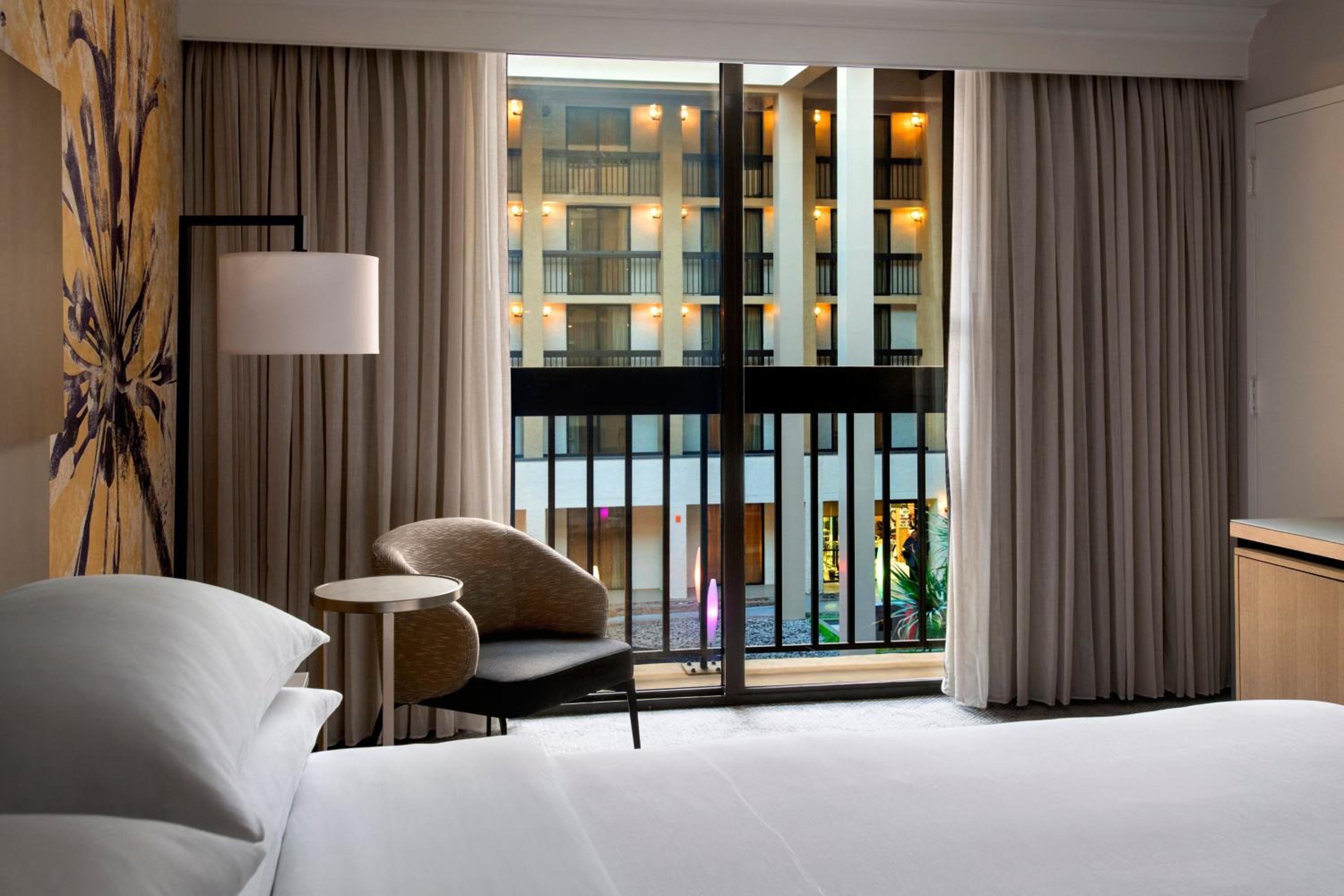 King Room with Juliet Balcony and Atrium View - Photo 7