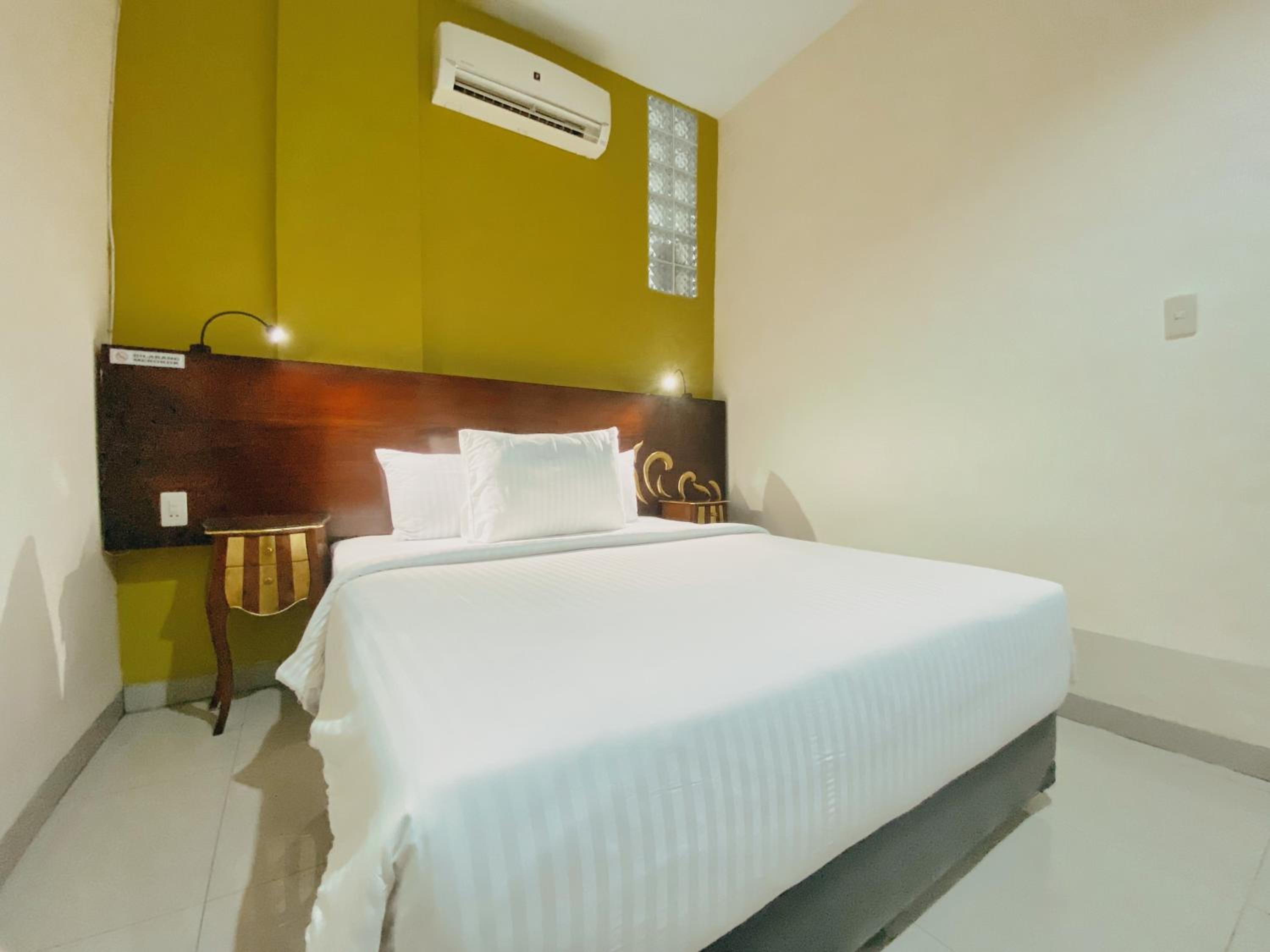 Deluxe Room - Photo 7
