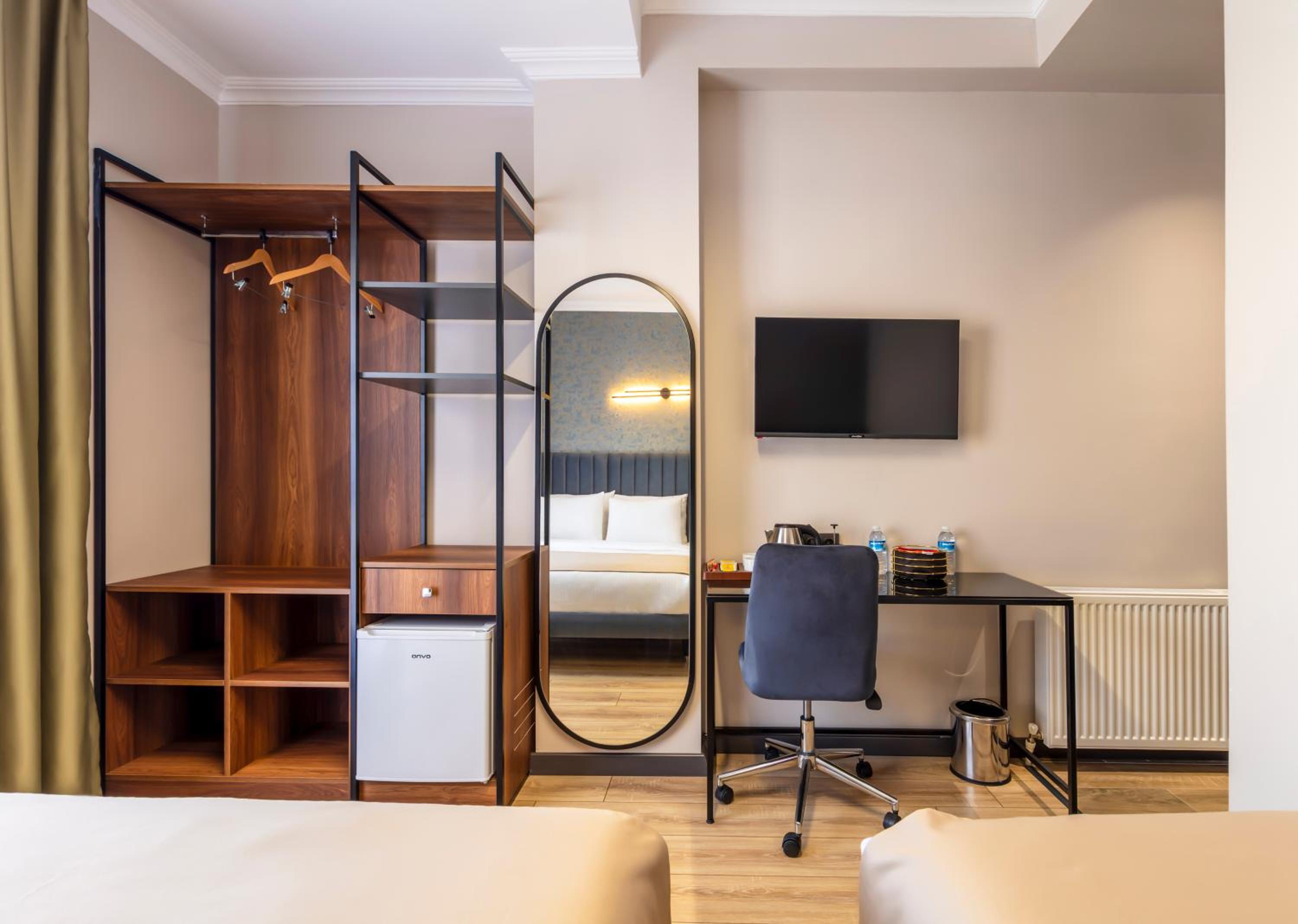 Deluxe Triple Room - Photo 10