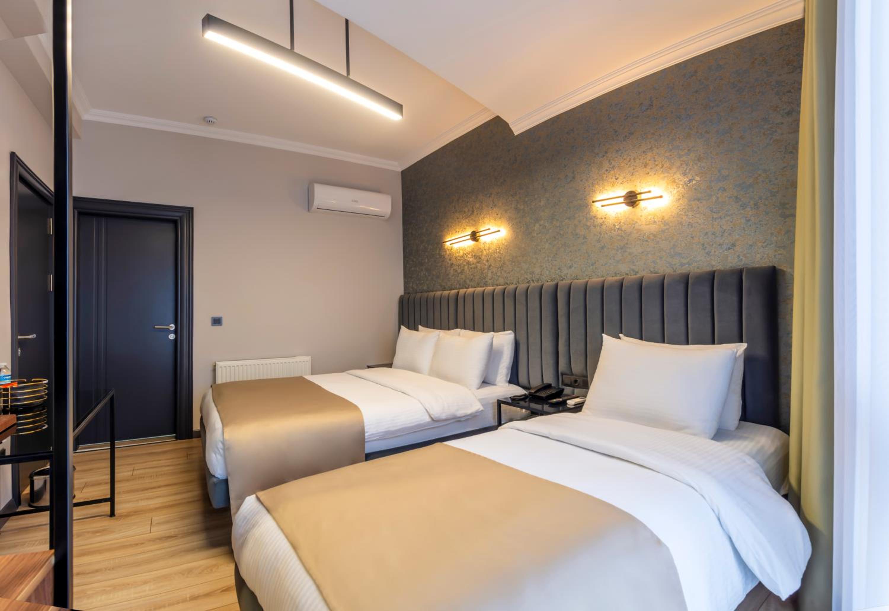 Deluxe Triple Room - Photo 15
