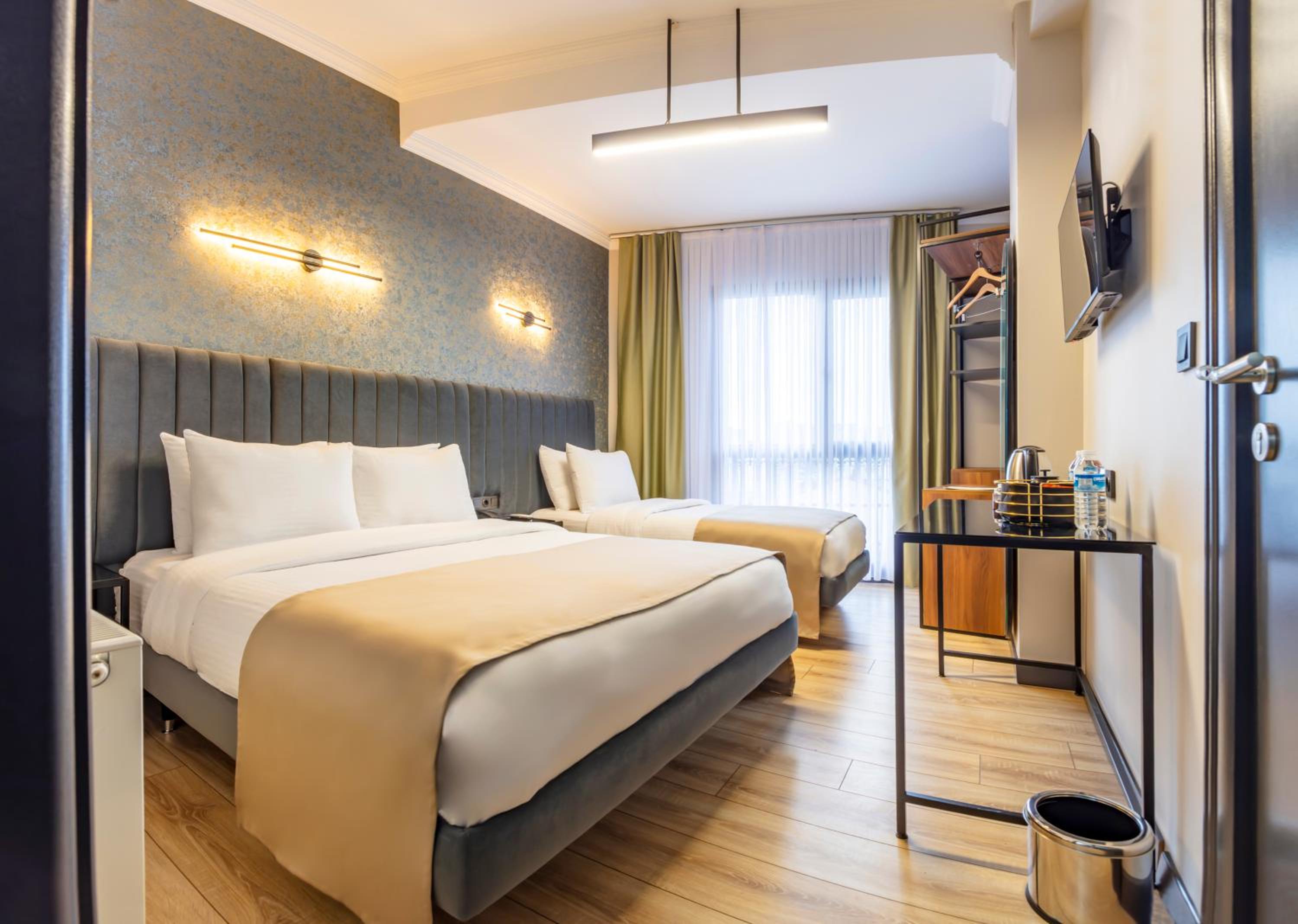 Deluxe Triple Room - Photo 14