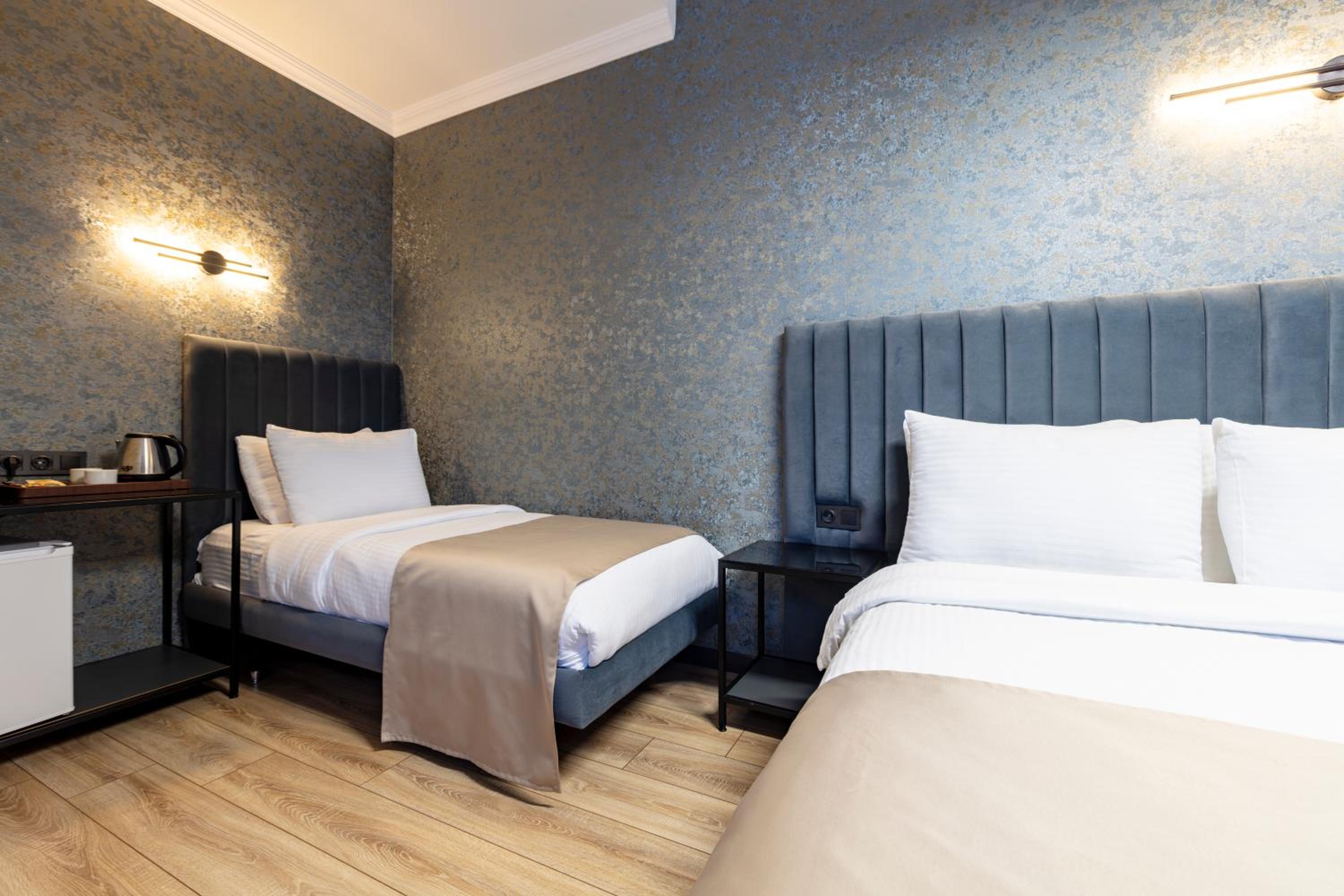 Deluxe Quadruple Room - Photo 8