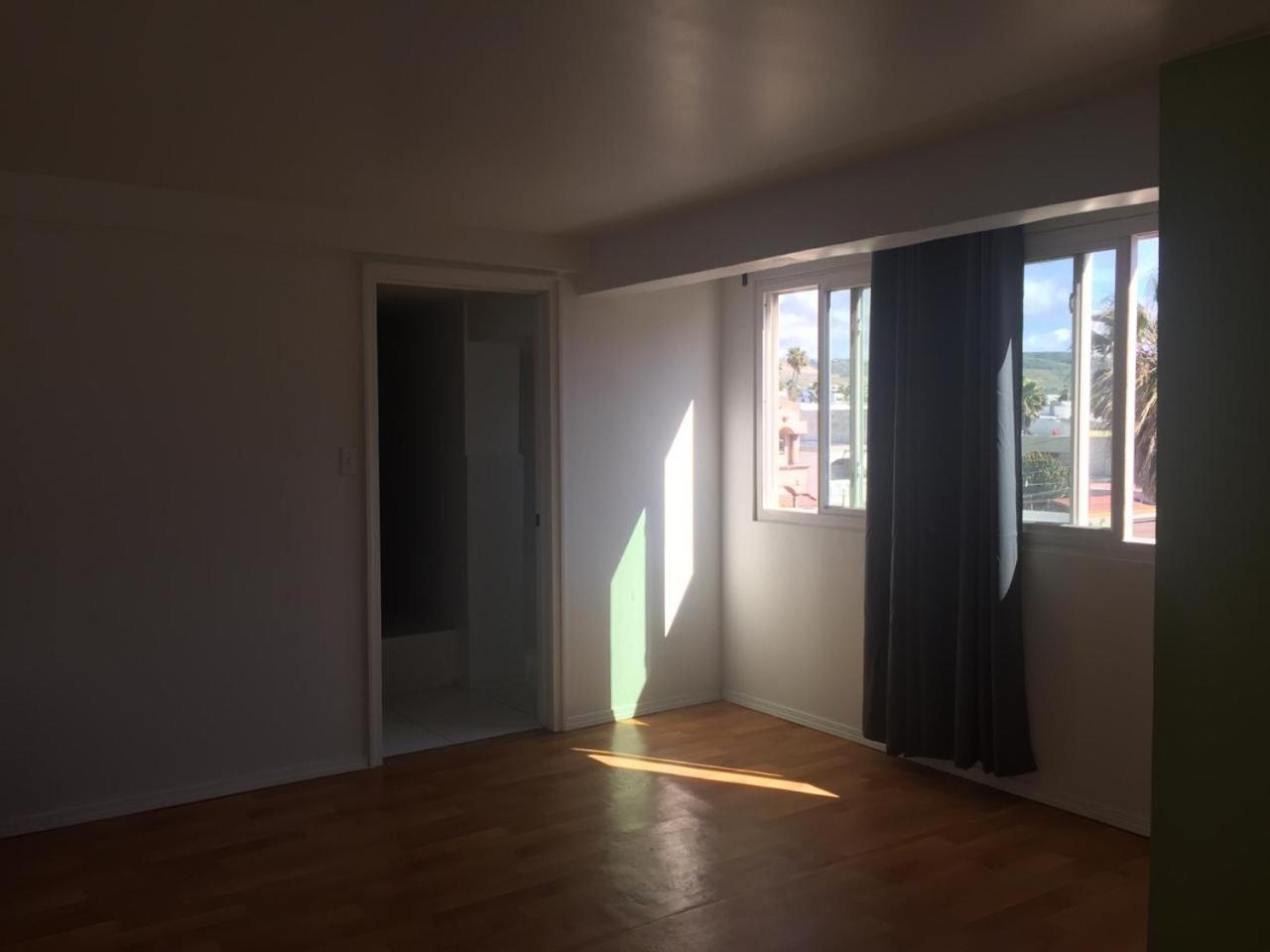 Three-Bedroom Apartment photo 1