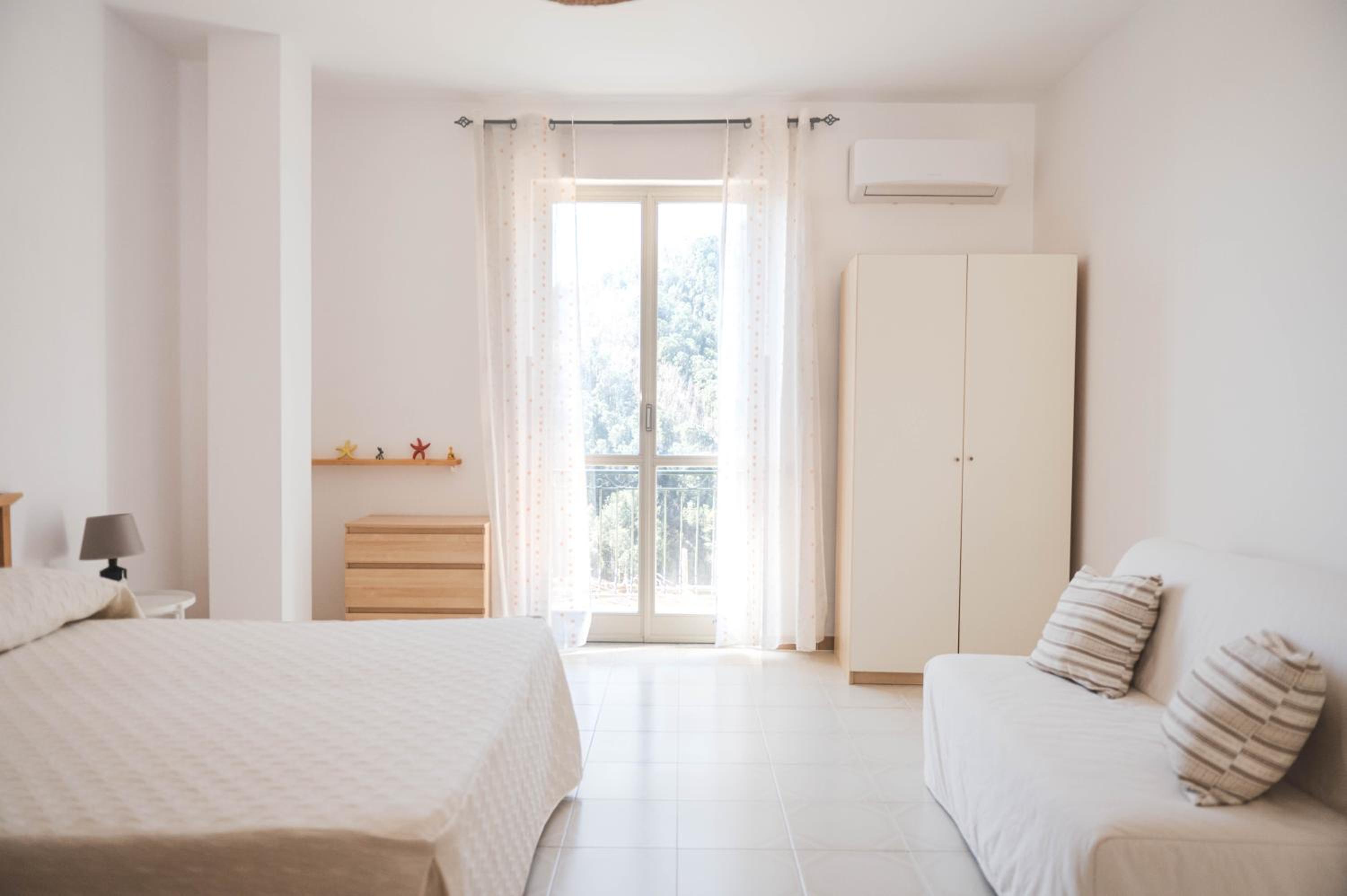Double Room with Balcony (2 Adults + 1 Child) photo 3