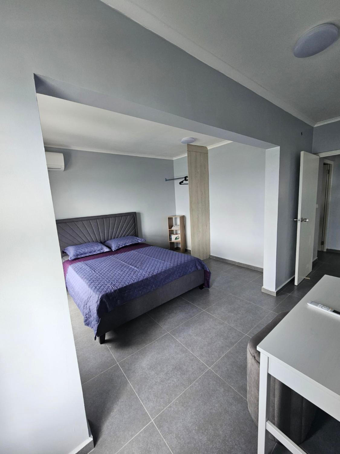 Three-Bedroom Apartment photo 1