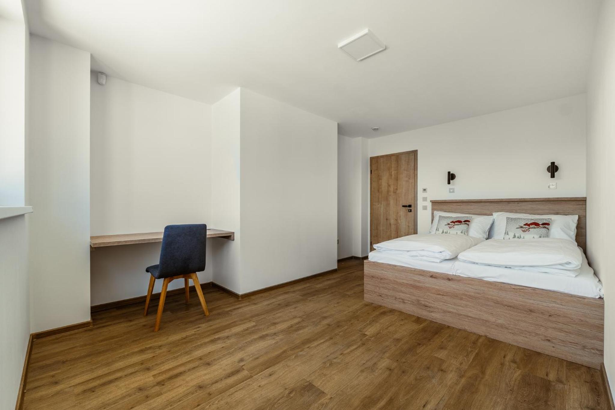 Three-Bedroom Apartment photo 1