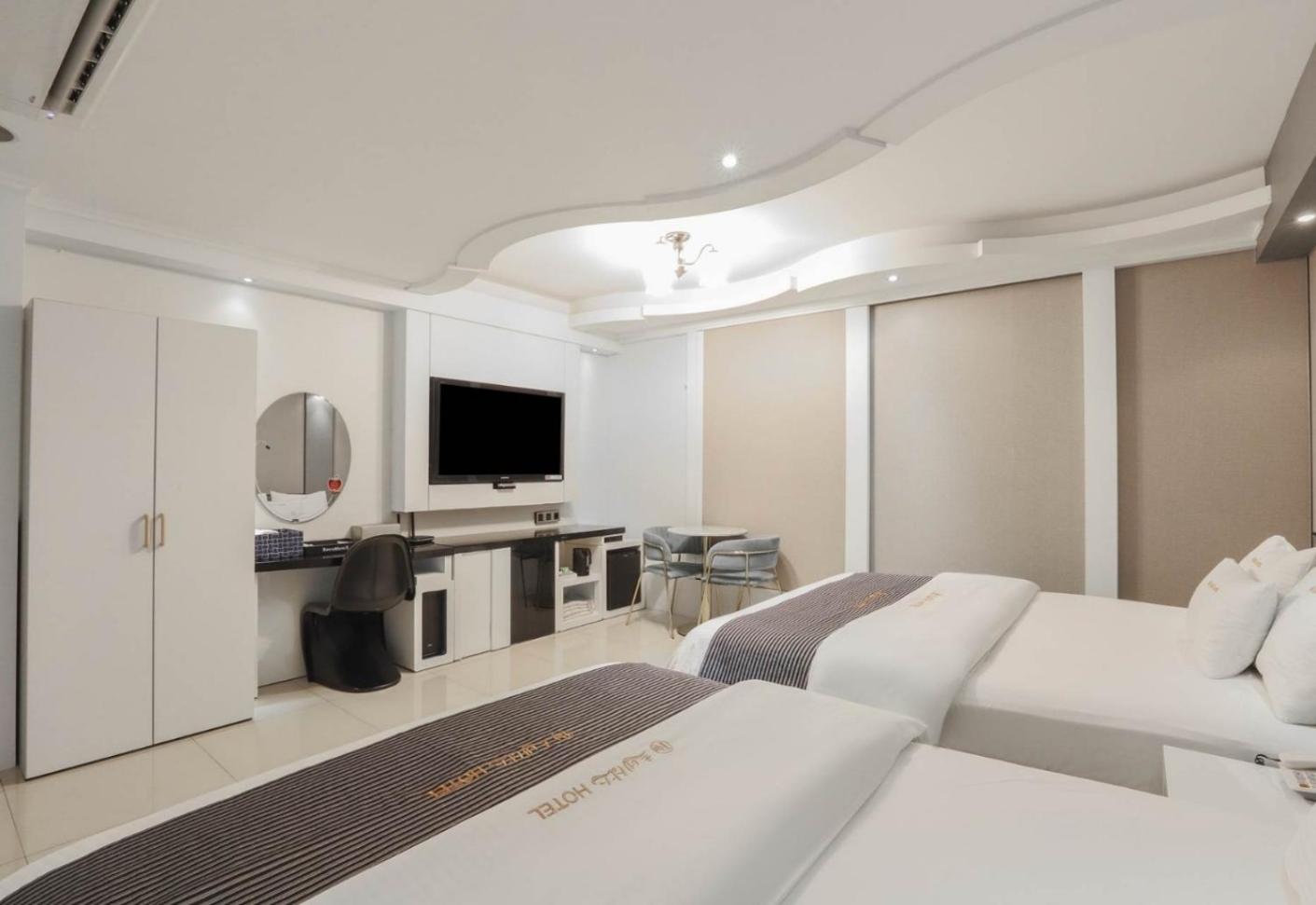 Superior Queen Room with Two Queen Beds - Photo 1