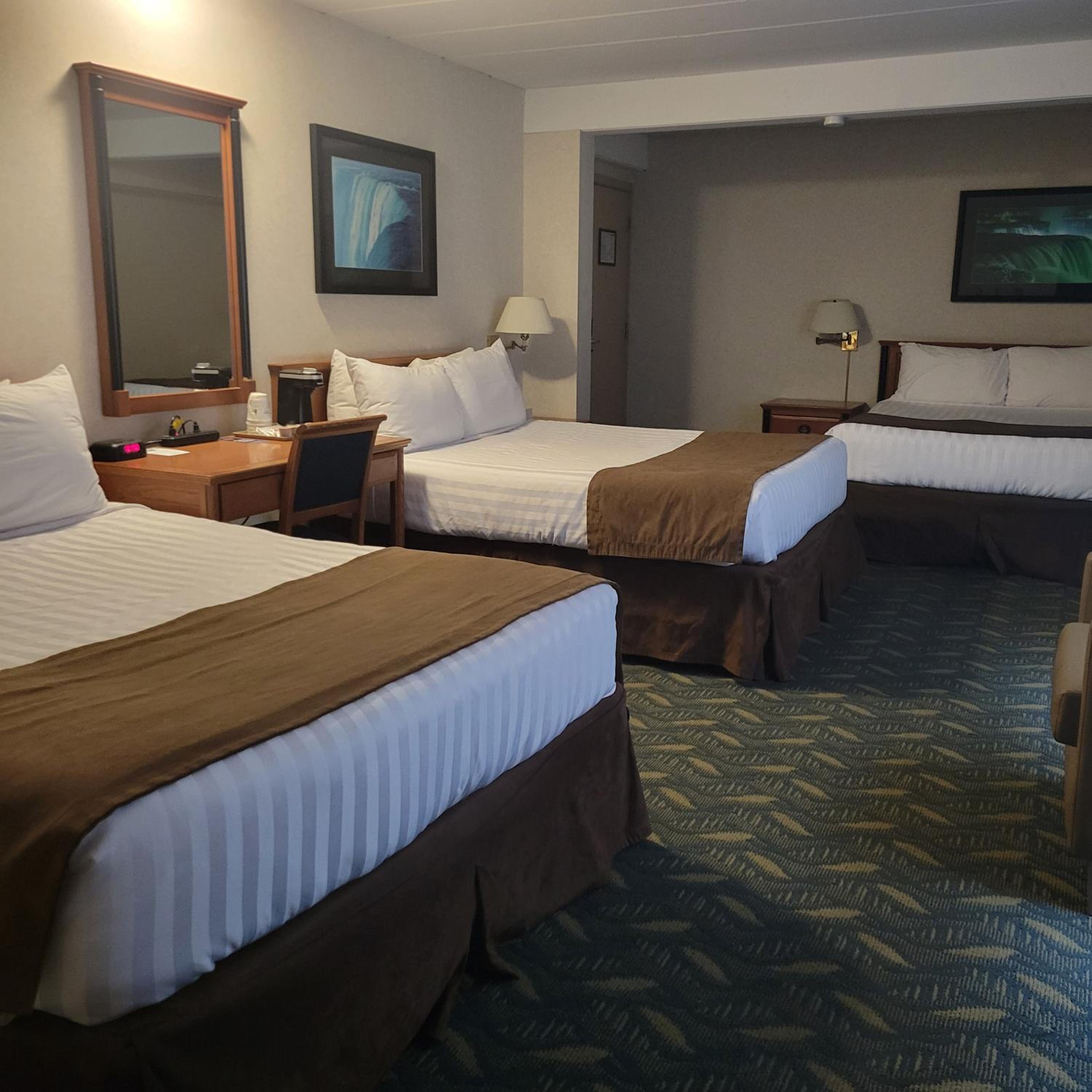 Queen Room with Three Queen Beds - Non-Smoking photo 1
