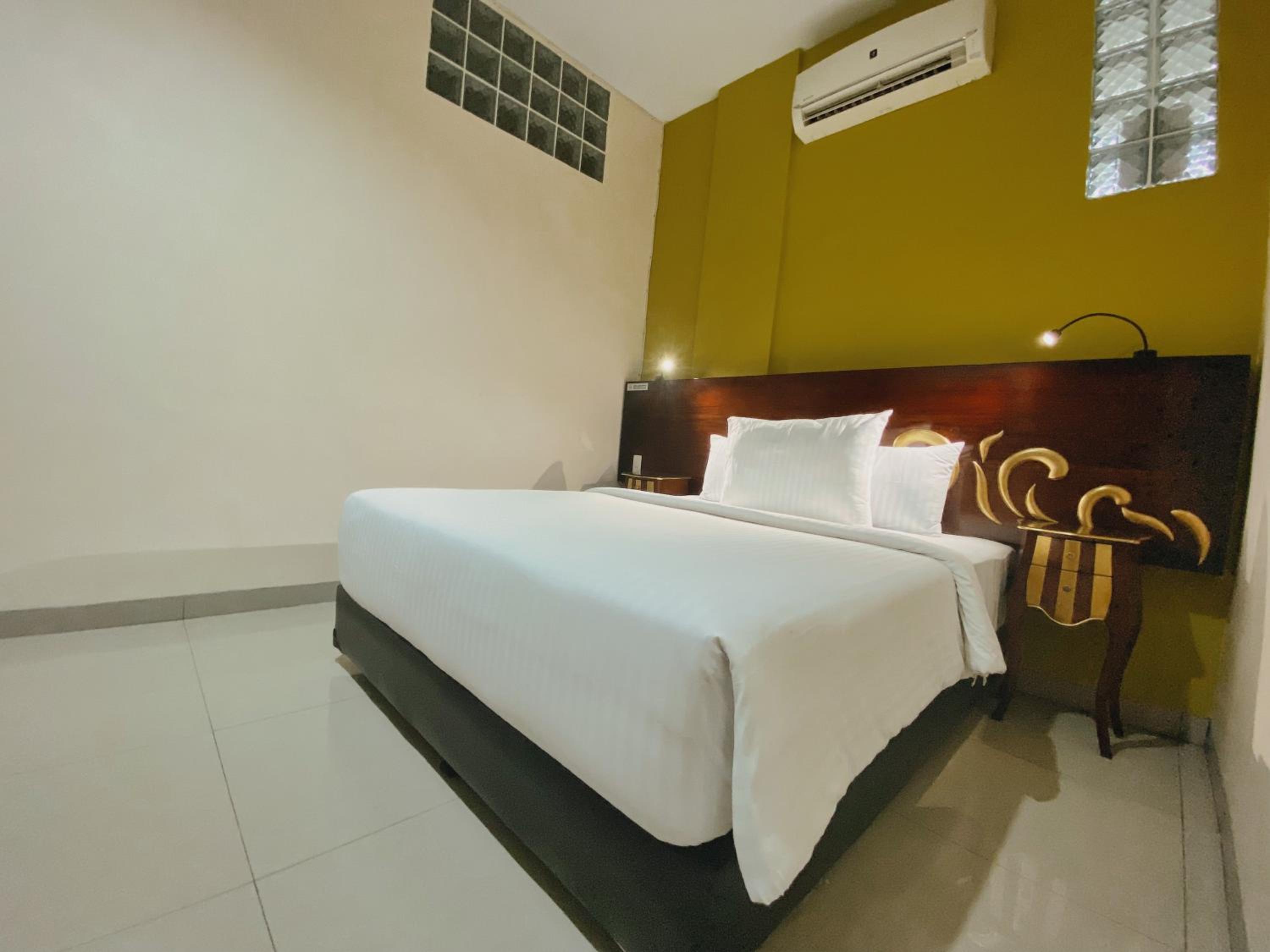Deluxe Room - Photo 4