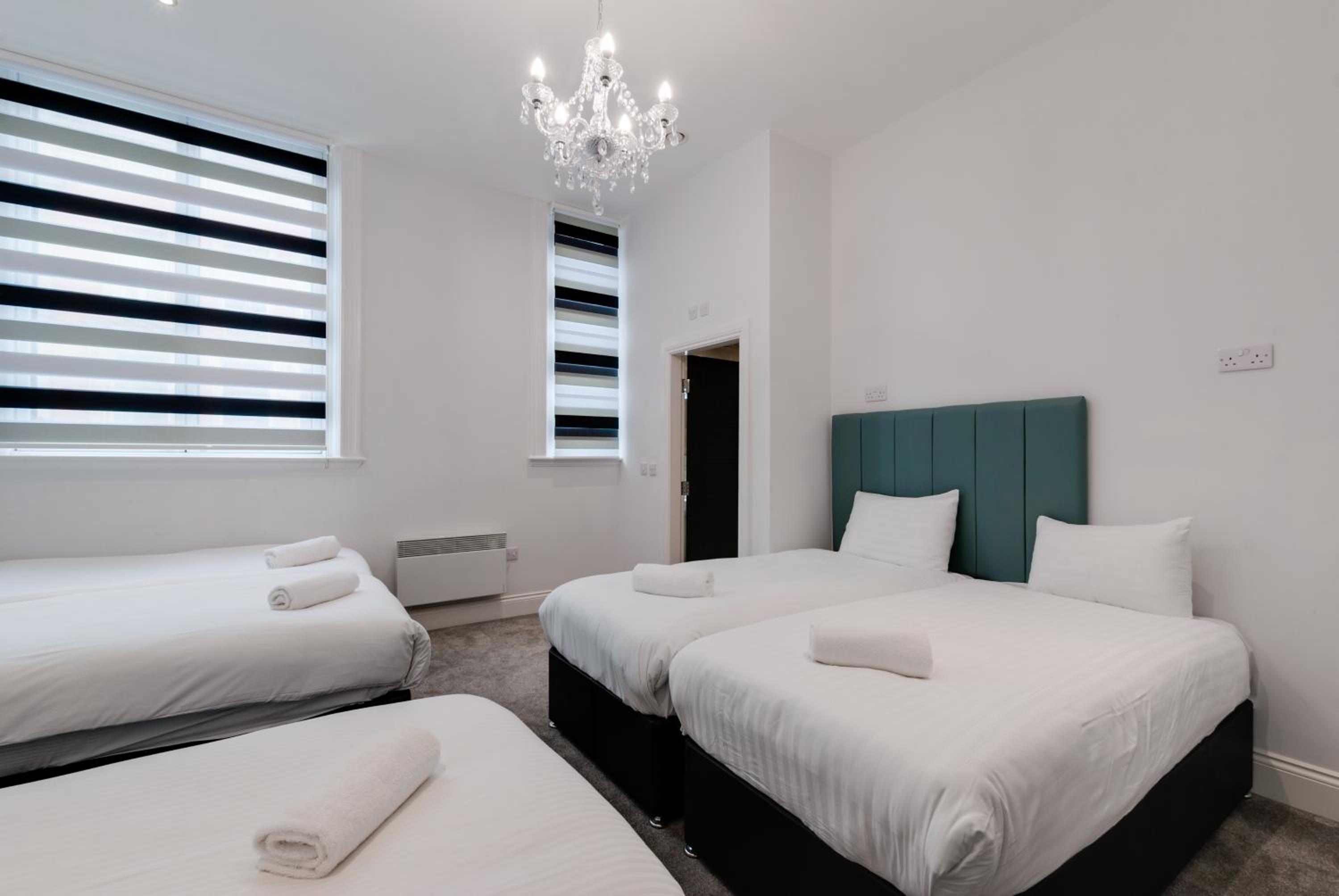 Three-Bedroom Apartment - Photo 2