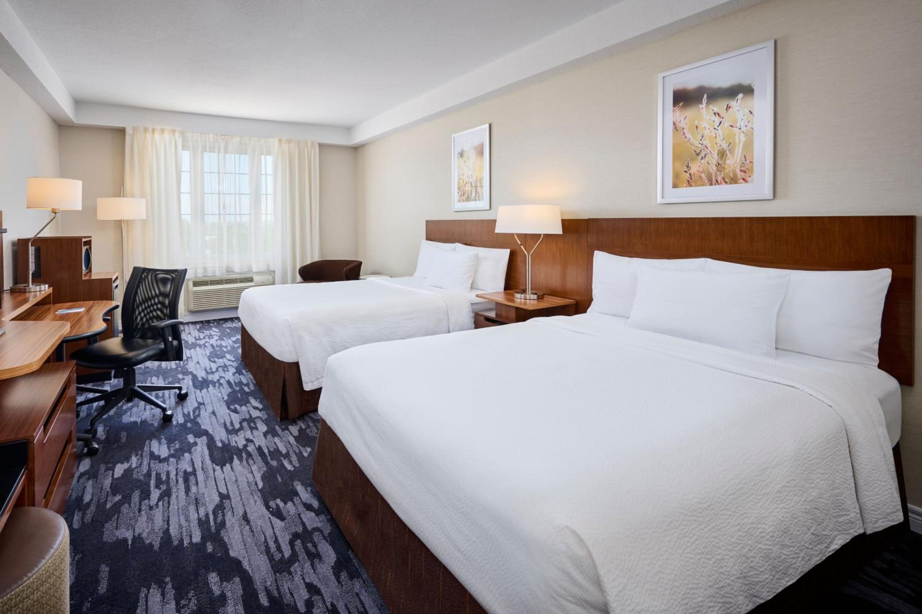 Queen Room with Two Queen Beds - Photo 1