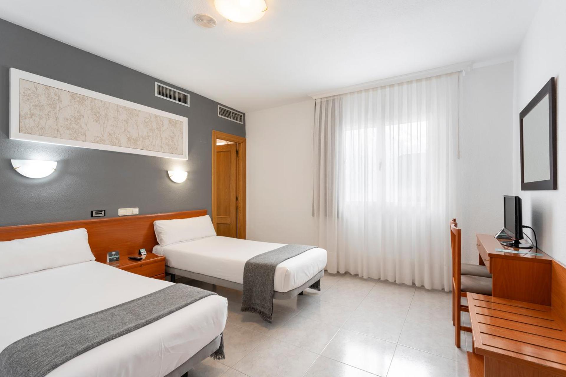 Habitación Doble Estándar o con Dos Camas Individuales.
