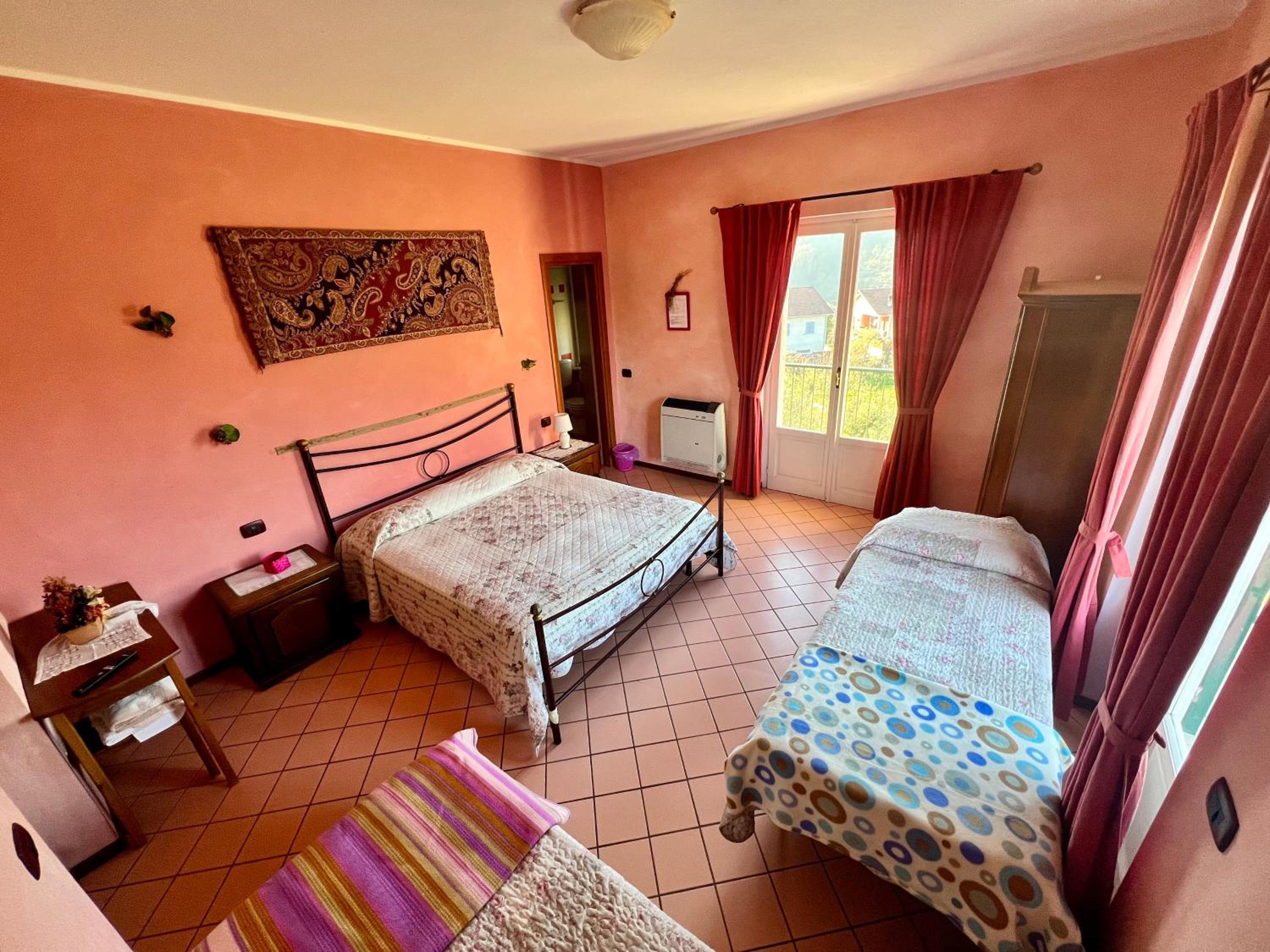 Quadruple Room with Balcony