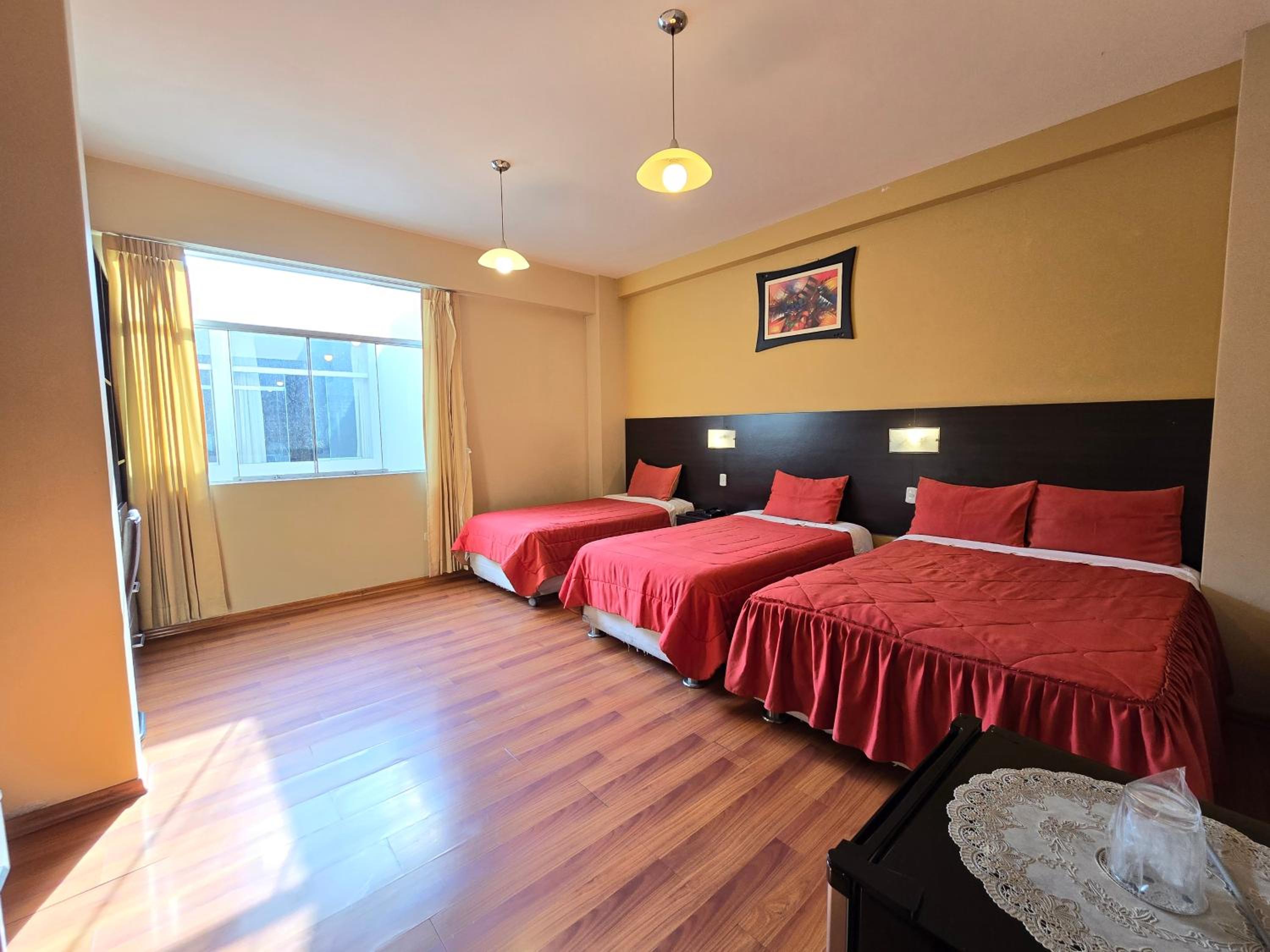 Quadruple Room with Private Bathroom photo 1