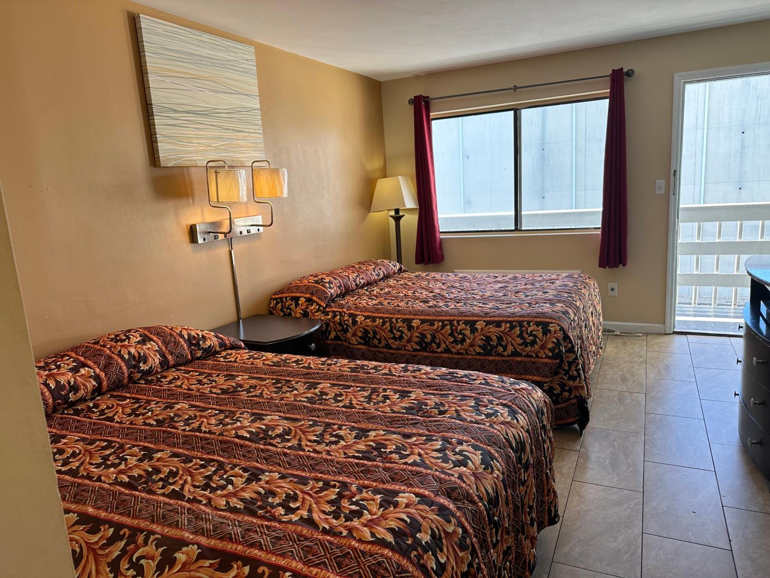 Superior Queen Room with Two Queen Beds - Photo 1