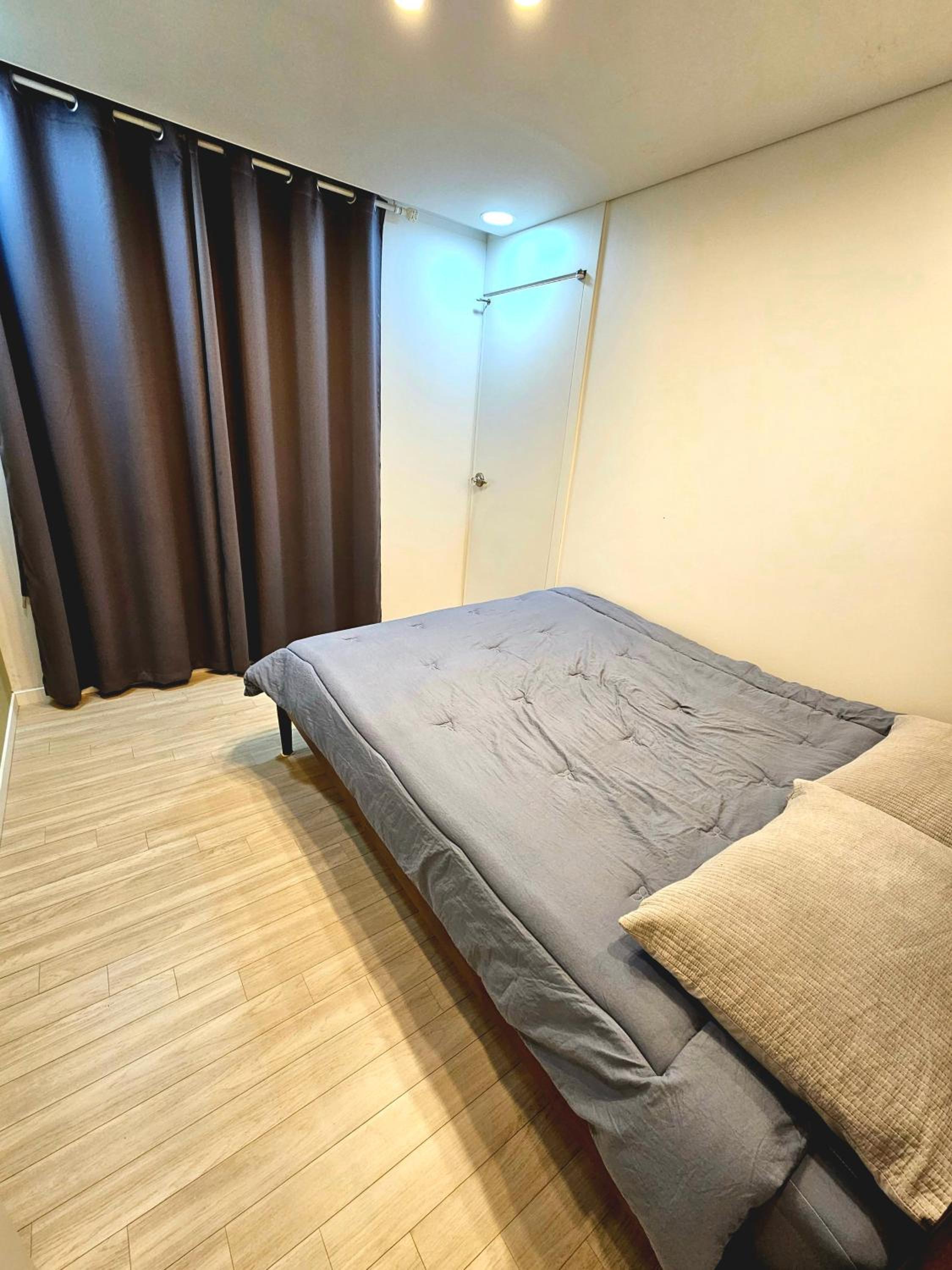 Three-Bedroom Apartment photo 2