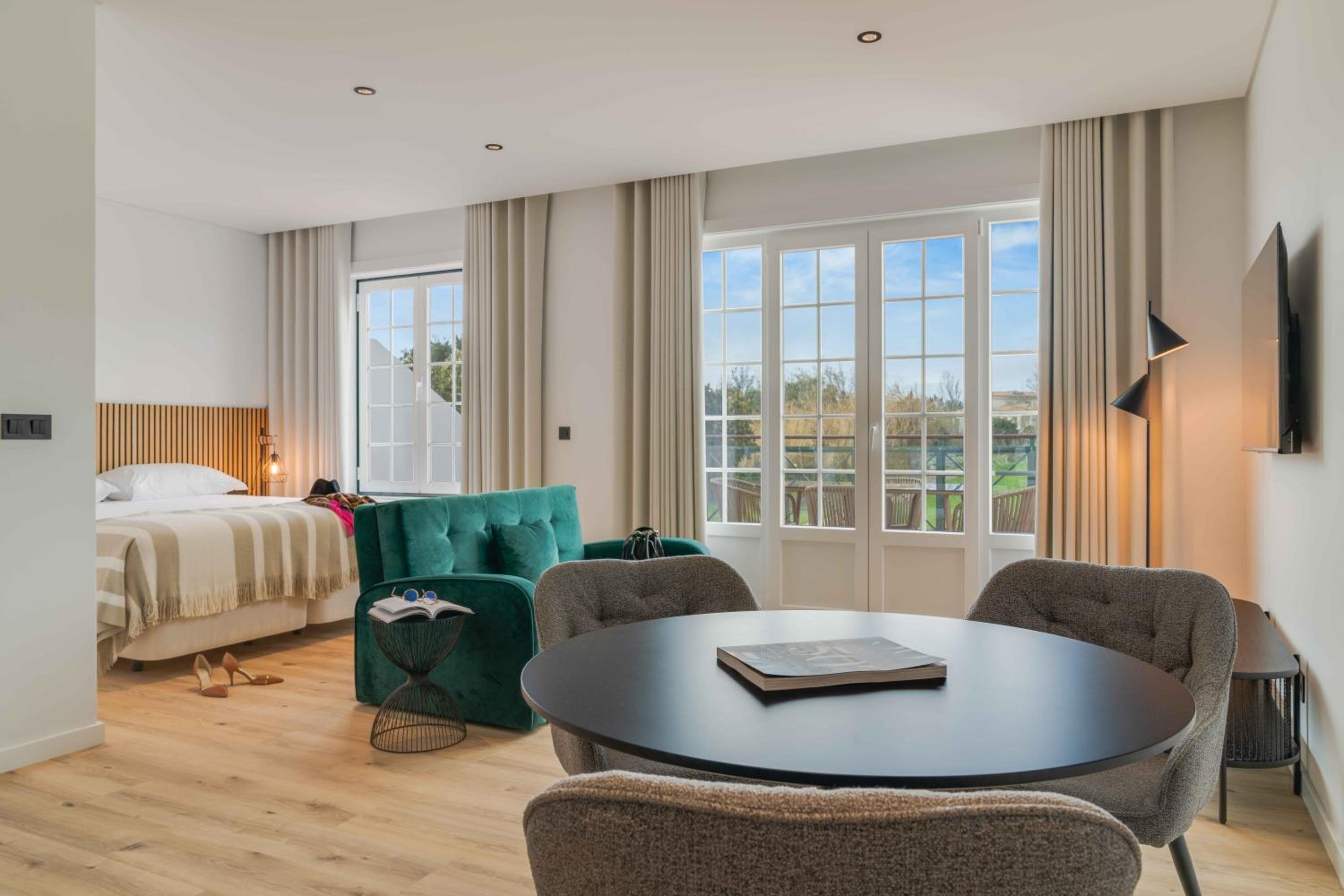Family Room with Balcony - Club House - Photo 1