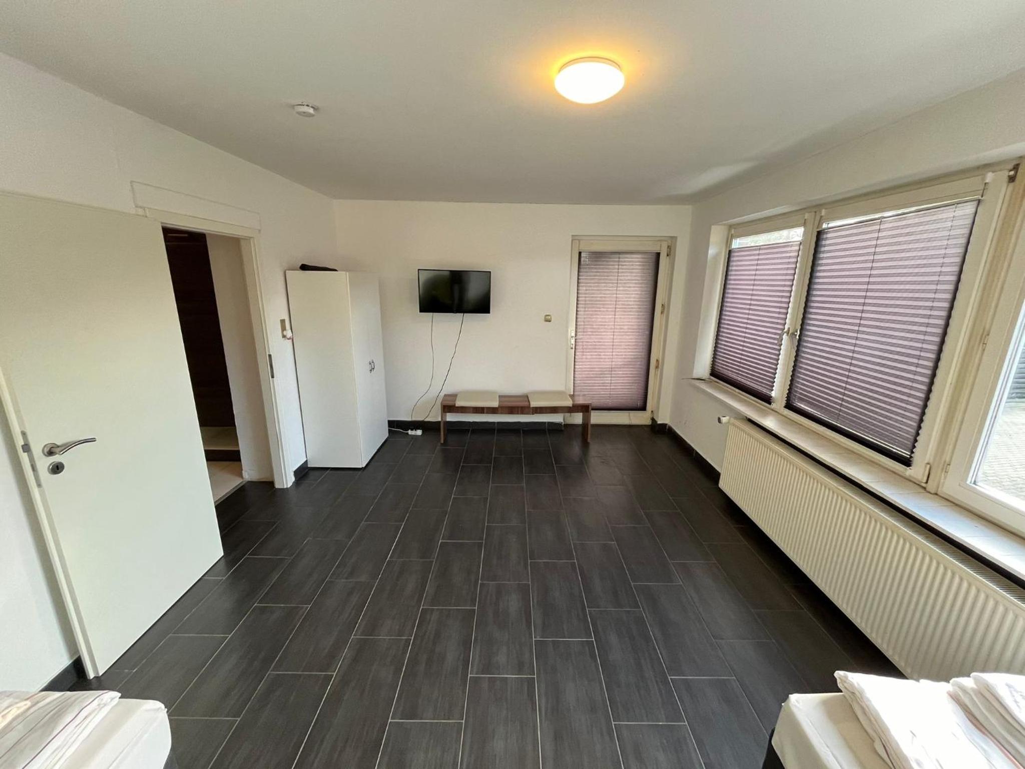 Three-Bedroom Apartment photo 1