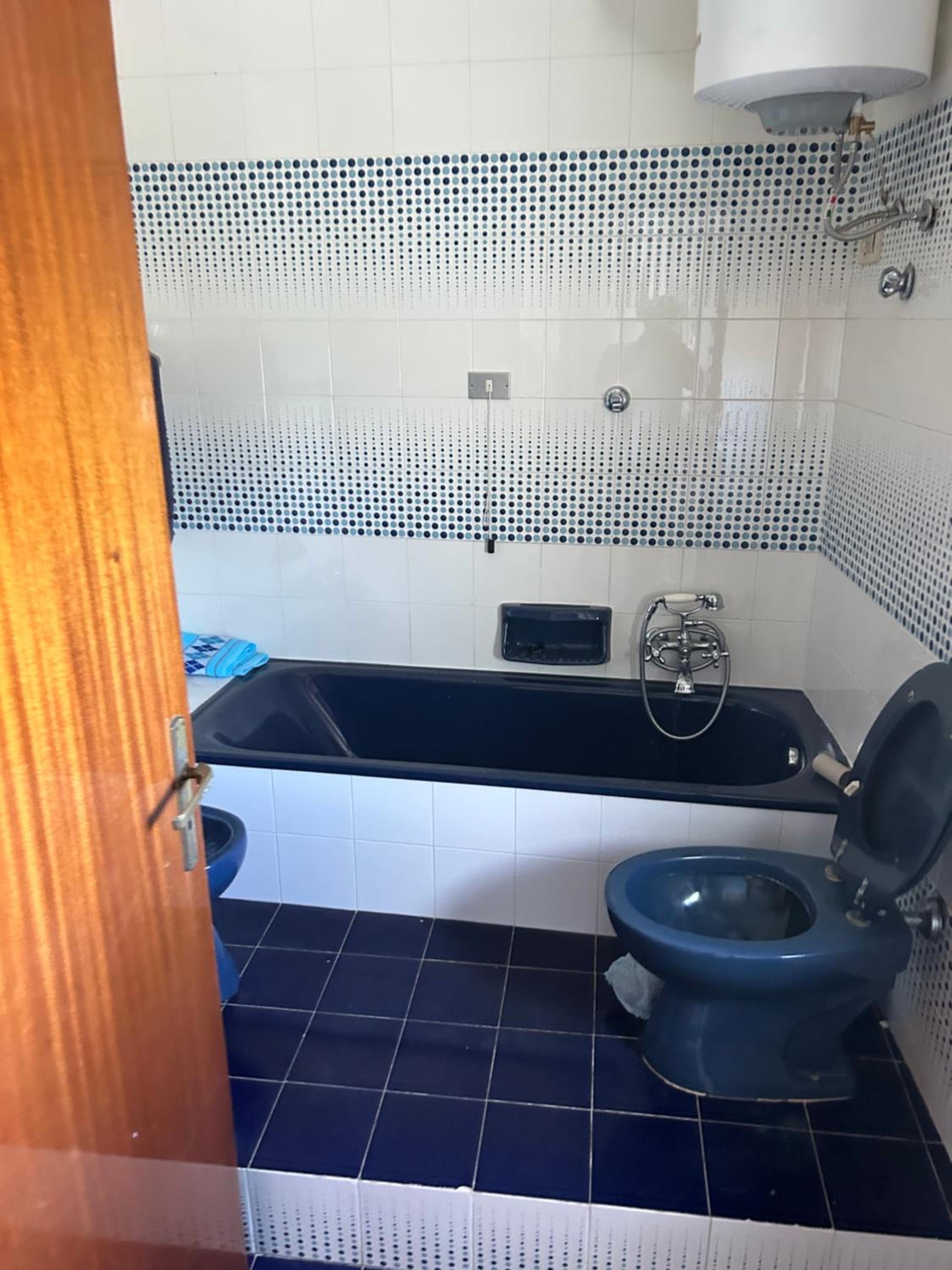 Basic Triple Room With Shared Bathroom photo 1