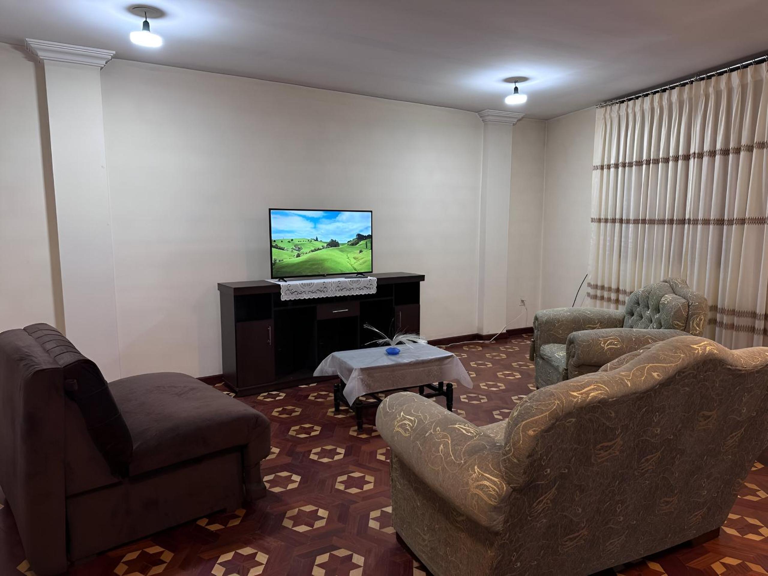 Three-Bedroom Apartment photo 2