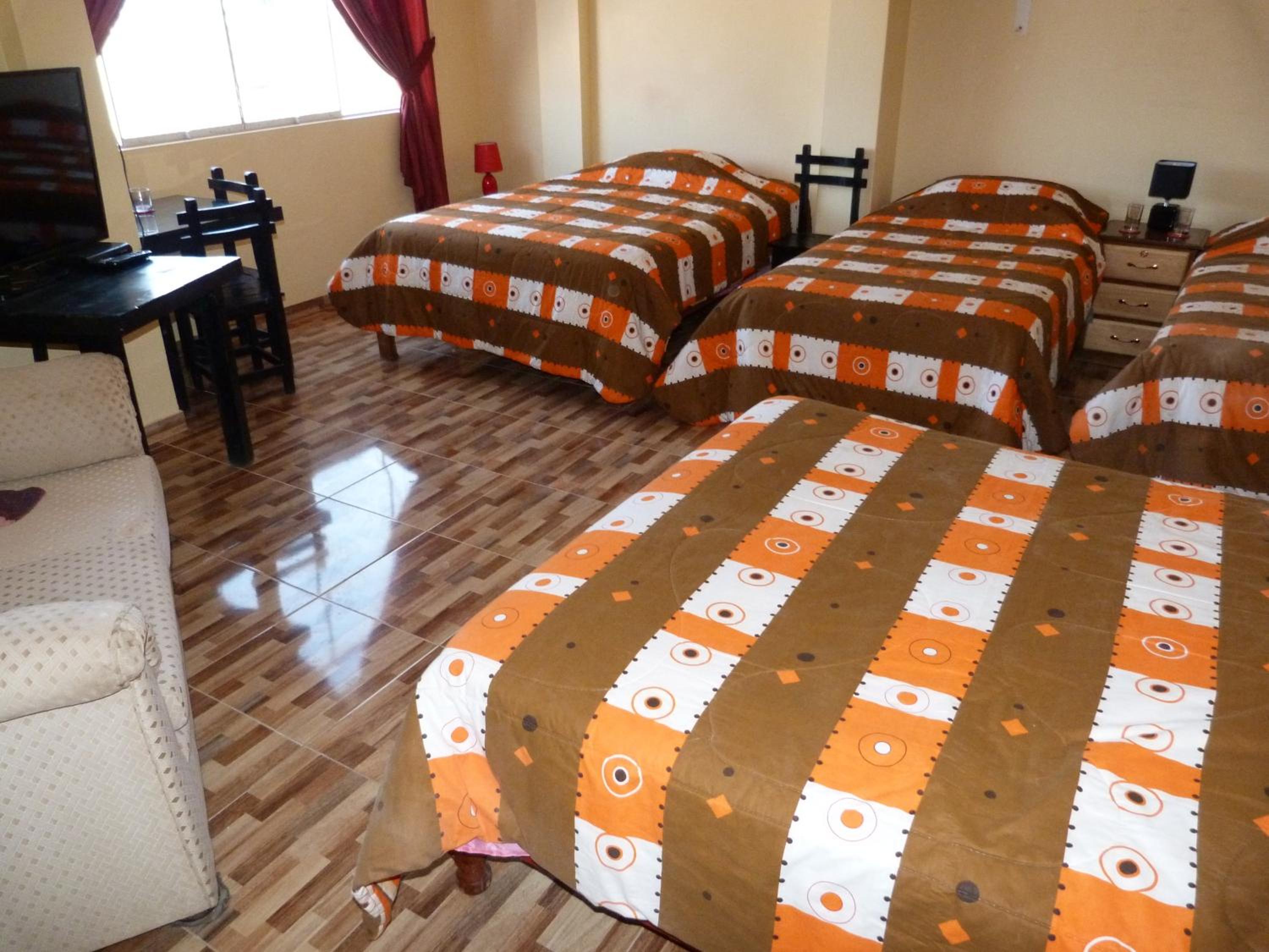 Quadruple Room with Private Bathroom photo 3