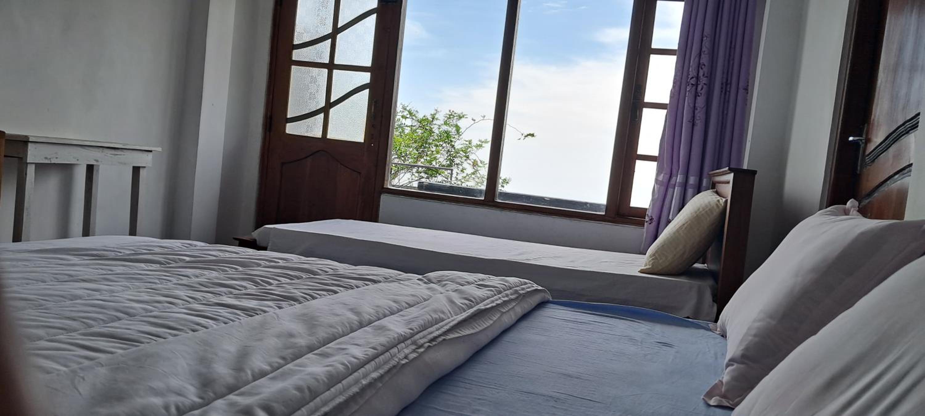 Double Room with Balcony (3 Adults)